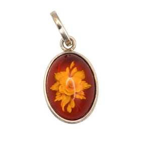 Oval Sterling Pendant with Reverse-Carved Floral Design 2.0g