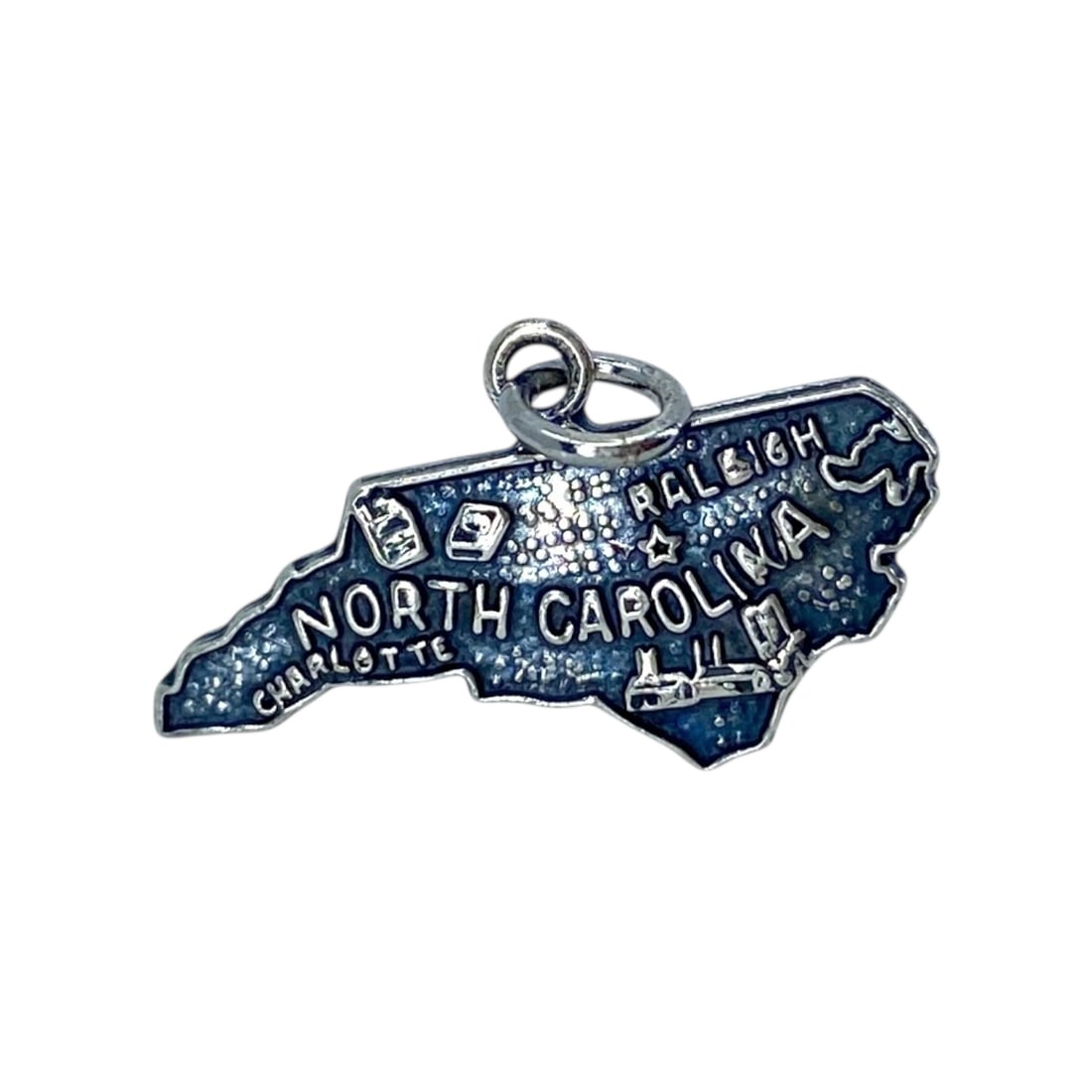 Engraved North Carolina Signed Sterling Silver State Charm, 1.15g: Engraved North Carolina Signed Sterling Silver State Charm, 1.15g, Engraved "F Sterling"
