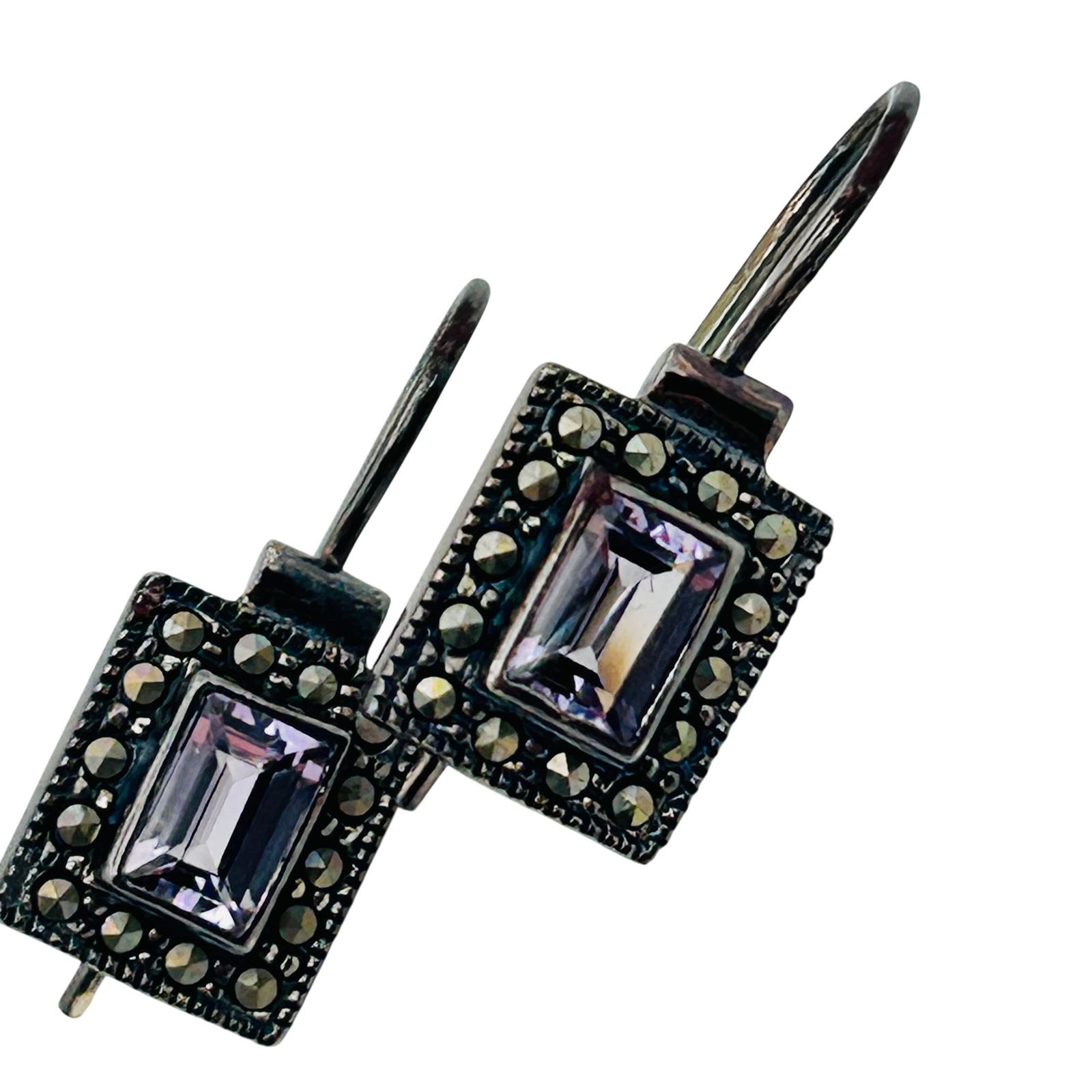 Sterling Marcasite And Purple Stone Earrings: MARCASITE Sterling purple stone earrings. 3.88 g