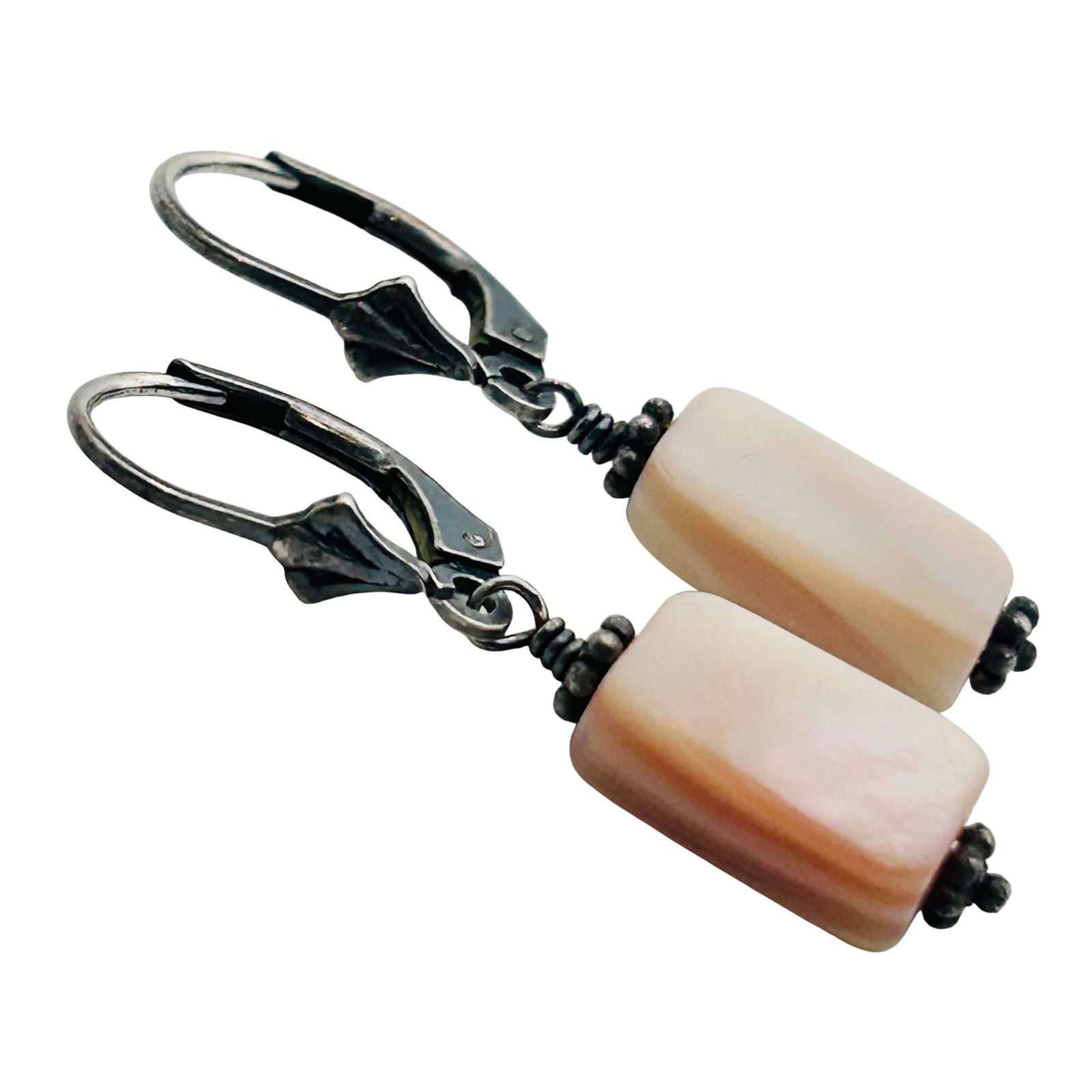 Sterling Mother Of Pearl Lever Back Earring: Mother of pearl Sterling lever back earring. 3.24g