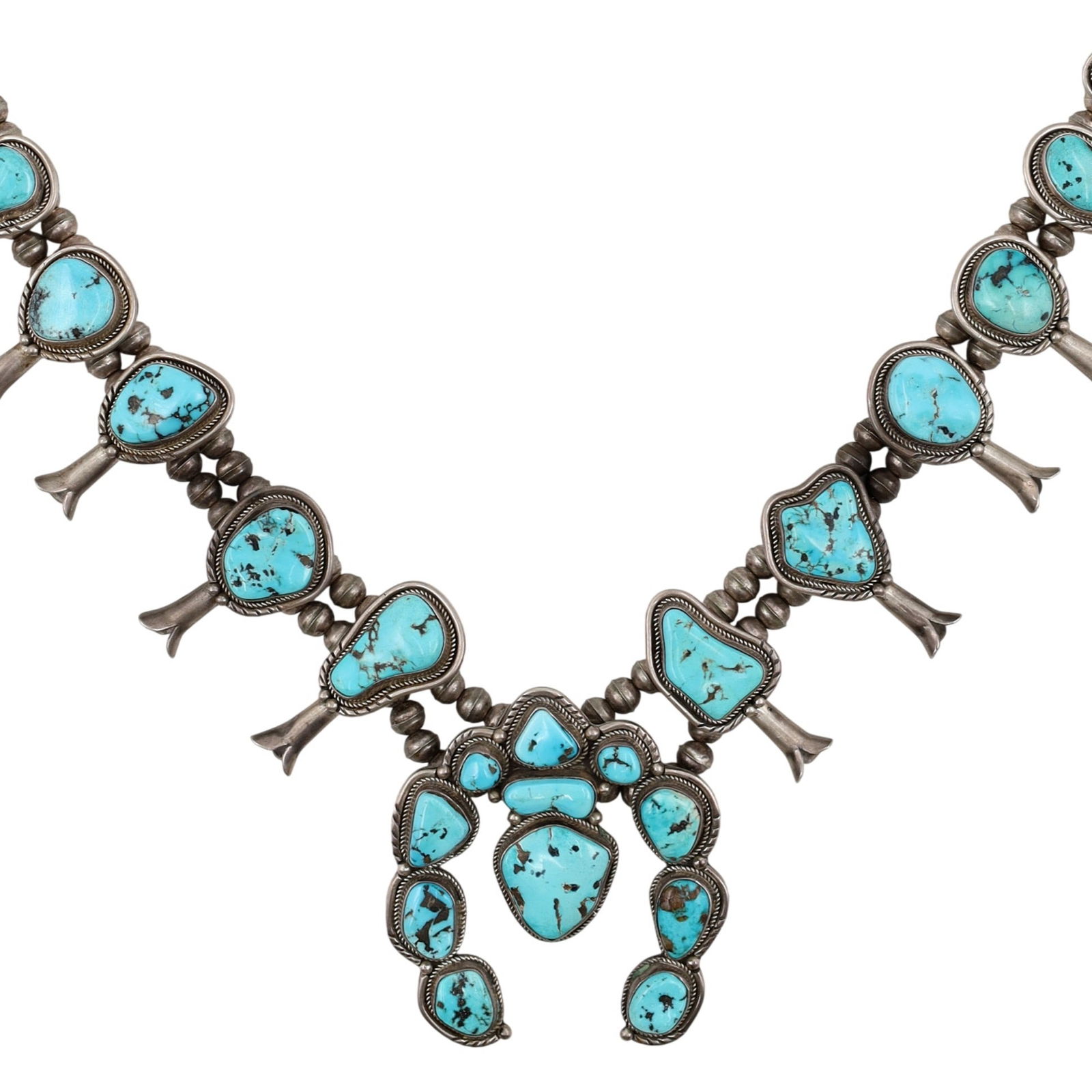 Richardson's Trading Post Signed Vintage Navajo Sterling Turquoise Squash Blossom: Presented in partnership with the historic Richardson’s Trading Post, a cornerstone of Native American jewelry since 1913. Selected from their archives of rare vintage and contemporary pieces. Signe
