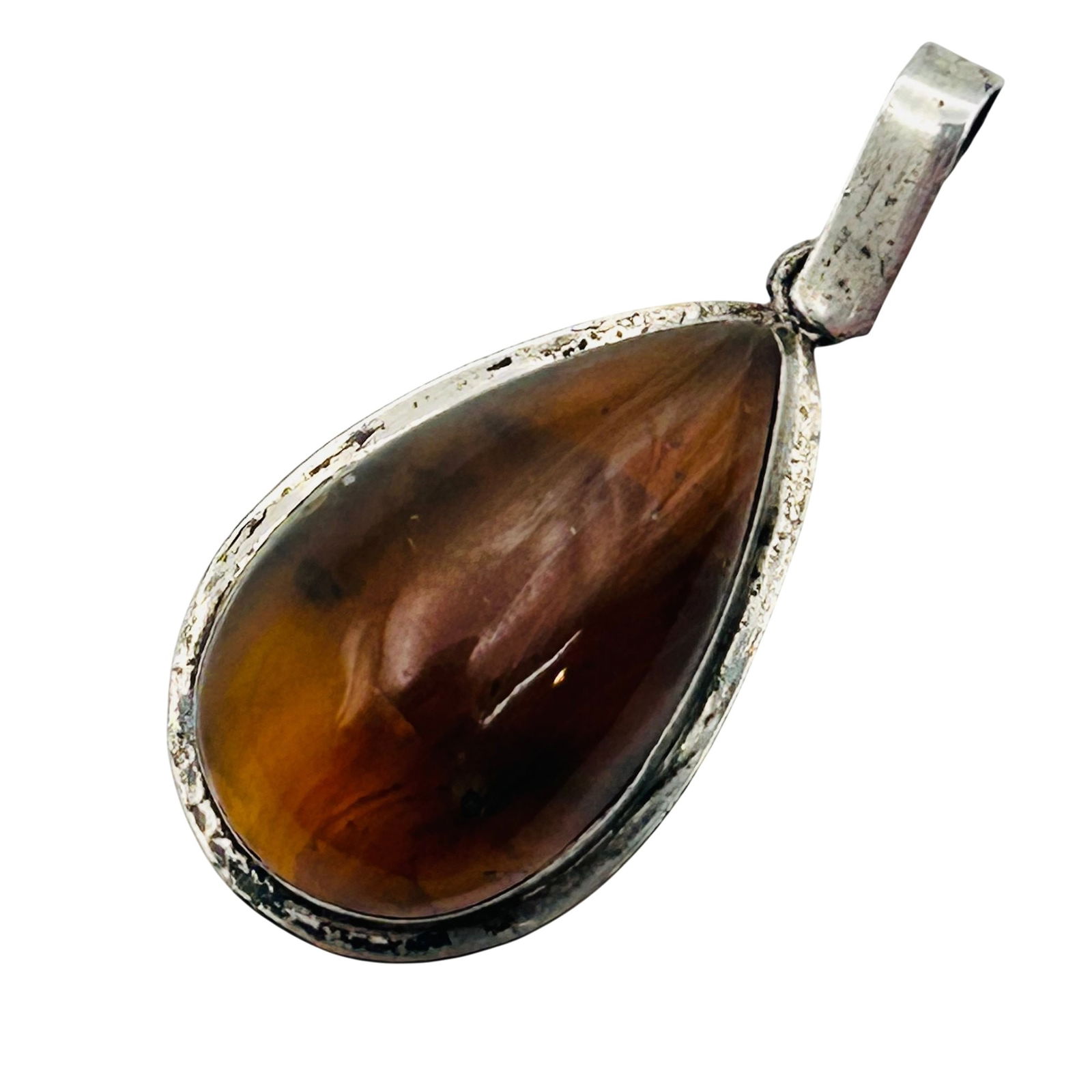 Sterling Amber Teardrop Pendant: Sterling Amber teardrop pendant. 3.40g
