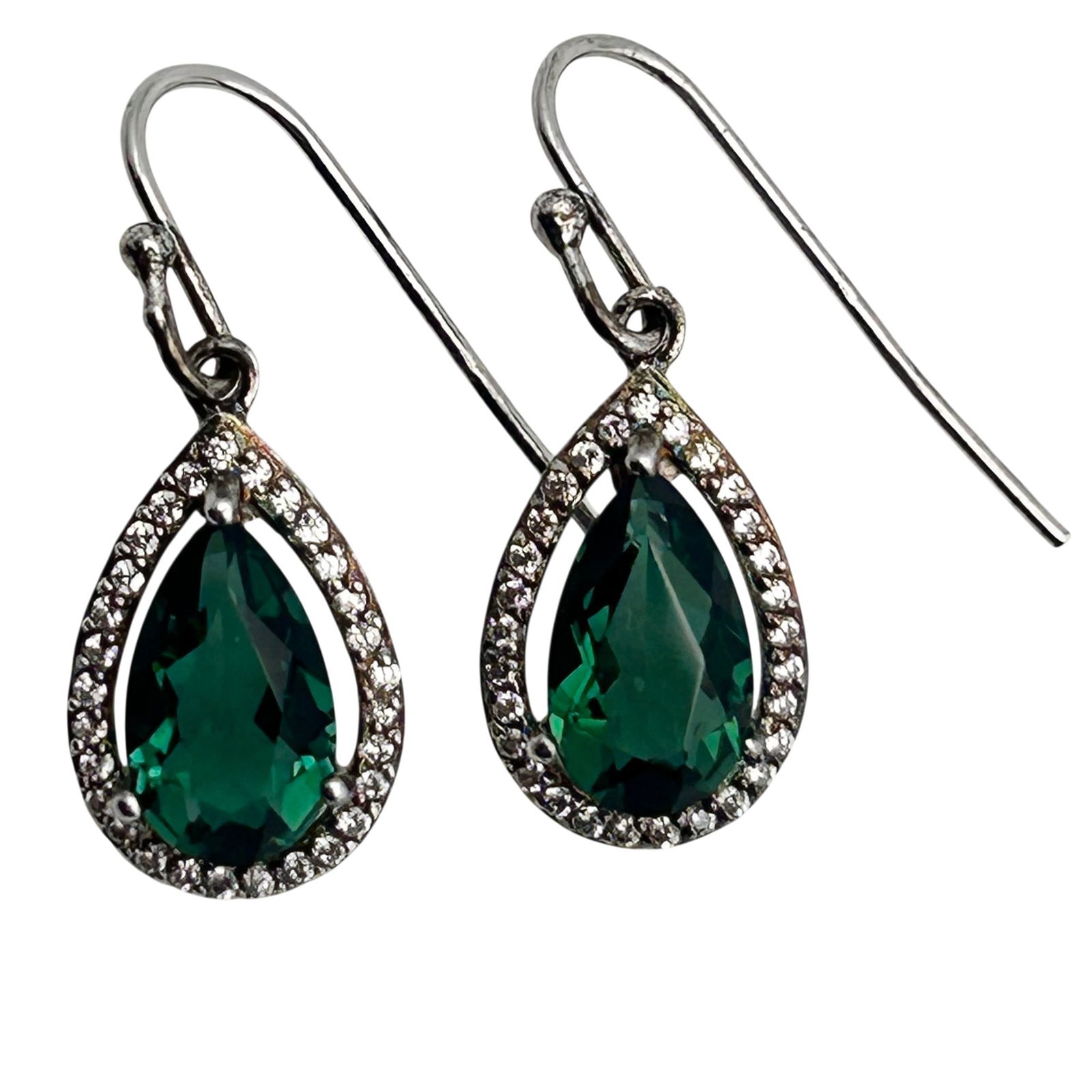 Sterling Emerald Halo Set Teardrop Earrings: Sterling emerald halo set teardrop earrings. 2.10g