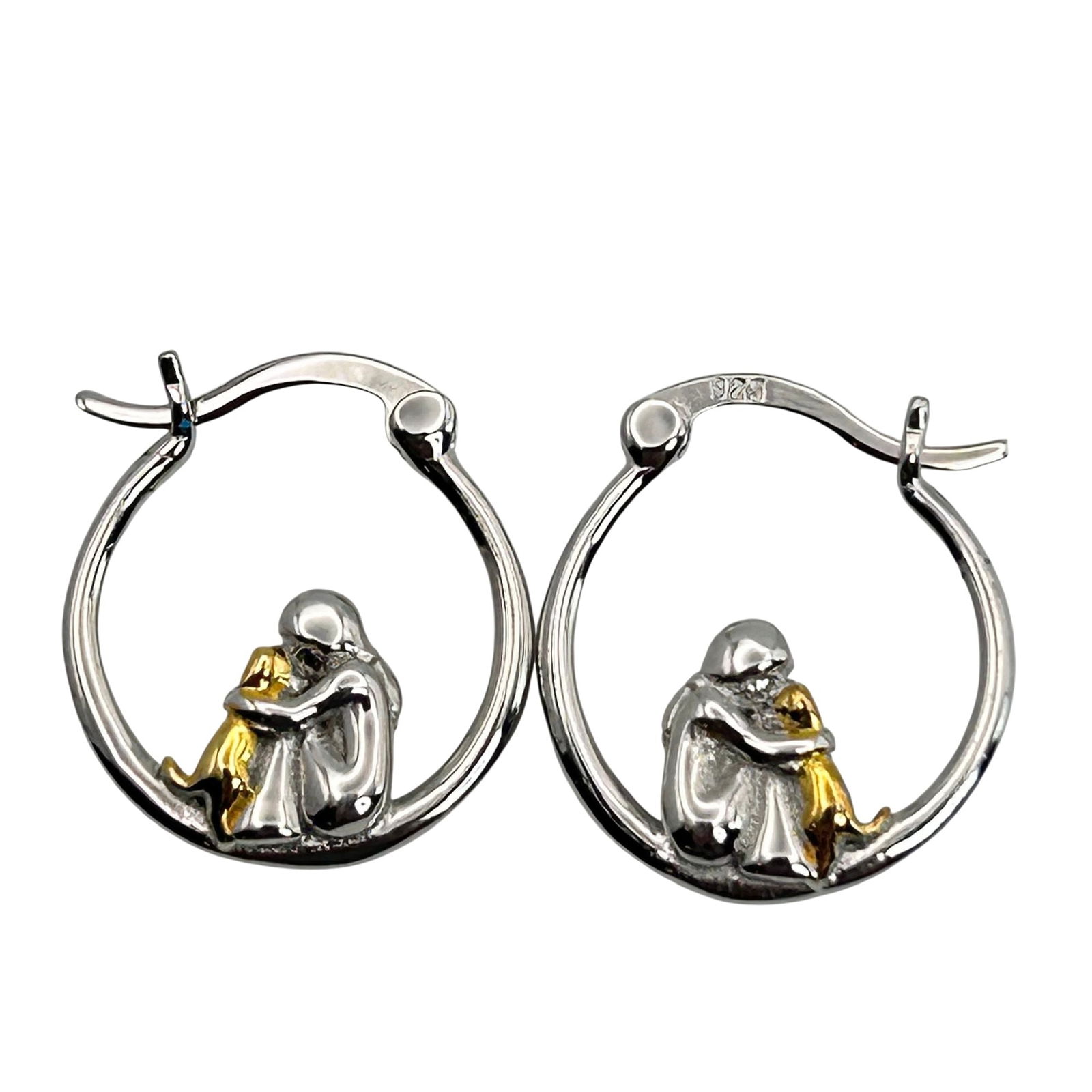 Sterling Dog And Owner Hoop Earrings: Sterling dog and owner hoop earrings. 2.50g