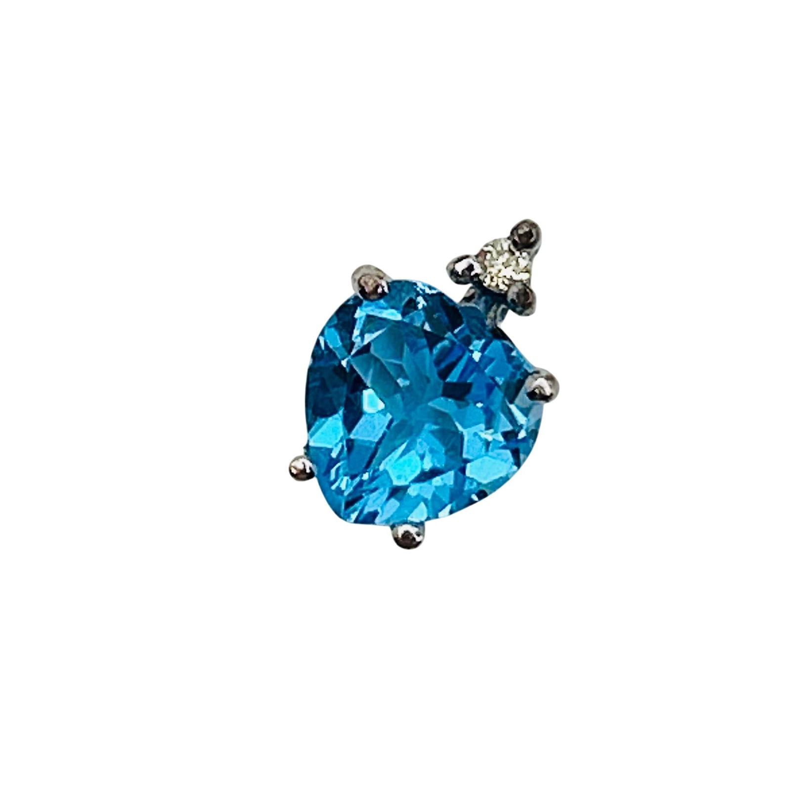 Sterling Topaz And Diamond Heart Pendant: Sterling topaz and diamond heart pendant. 1.21g