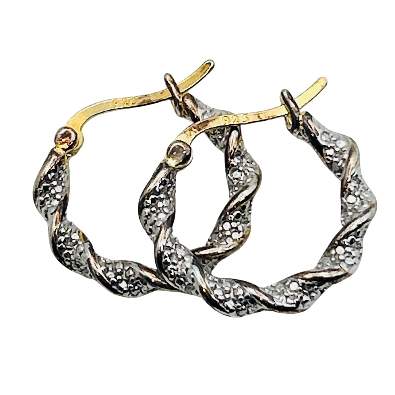 Sterling Clear Stone Twist Hoop Earrings: Sterling clear stone twist hoop earrings. 4.10 g.
