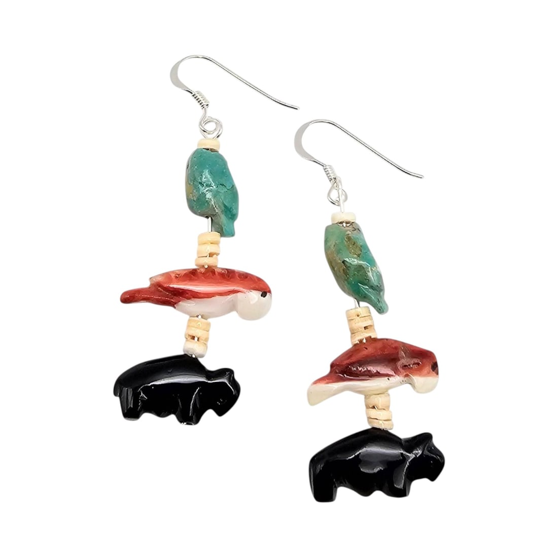 Navajo Carved Turquoise Coral Fetish Sterling Silver Earrings: Carved animal fetish earrings featuring turquoise, spiny oyster, and black onyx elements. The earrings include intricate depictions of animals and are spaced with bead separators. The hooks are sterli