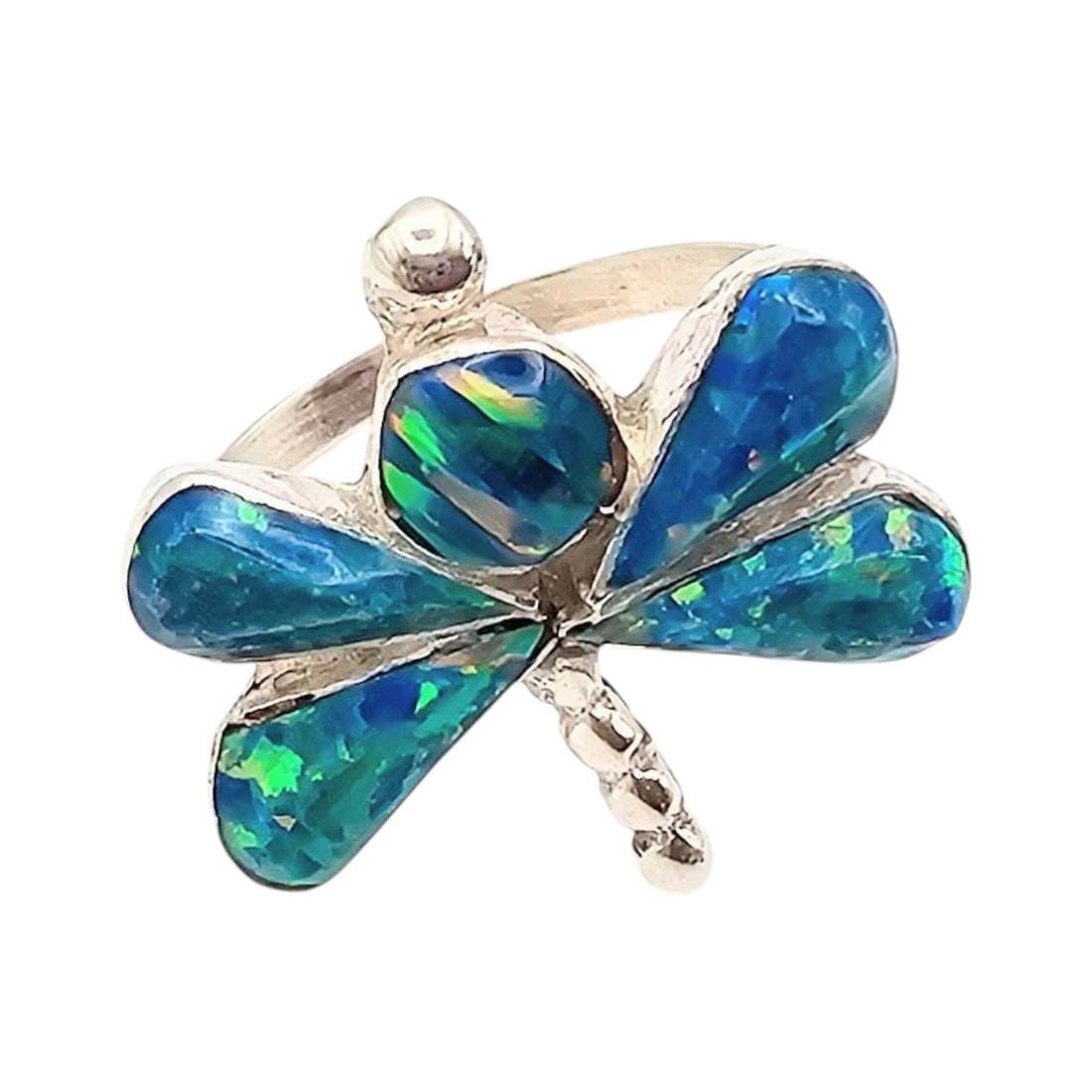 Charlie Swain Handmade Sterling Silver Opal Dragonfly Ring Size 6: Sterling silver dragonfly ring handcrafted by Zuni artisan Charlie Swain. The ring features inlaid opal stones with vibrant blue and green tones, arranged to form a dragonfly design. Size 6 with a wei