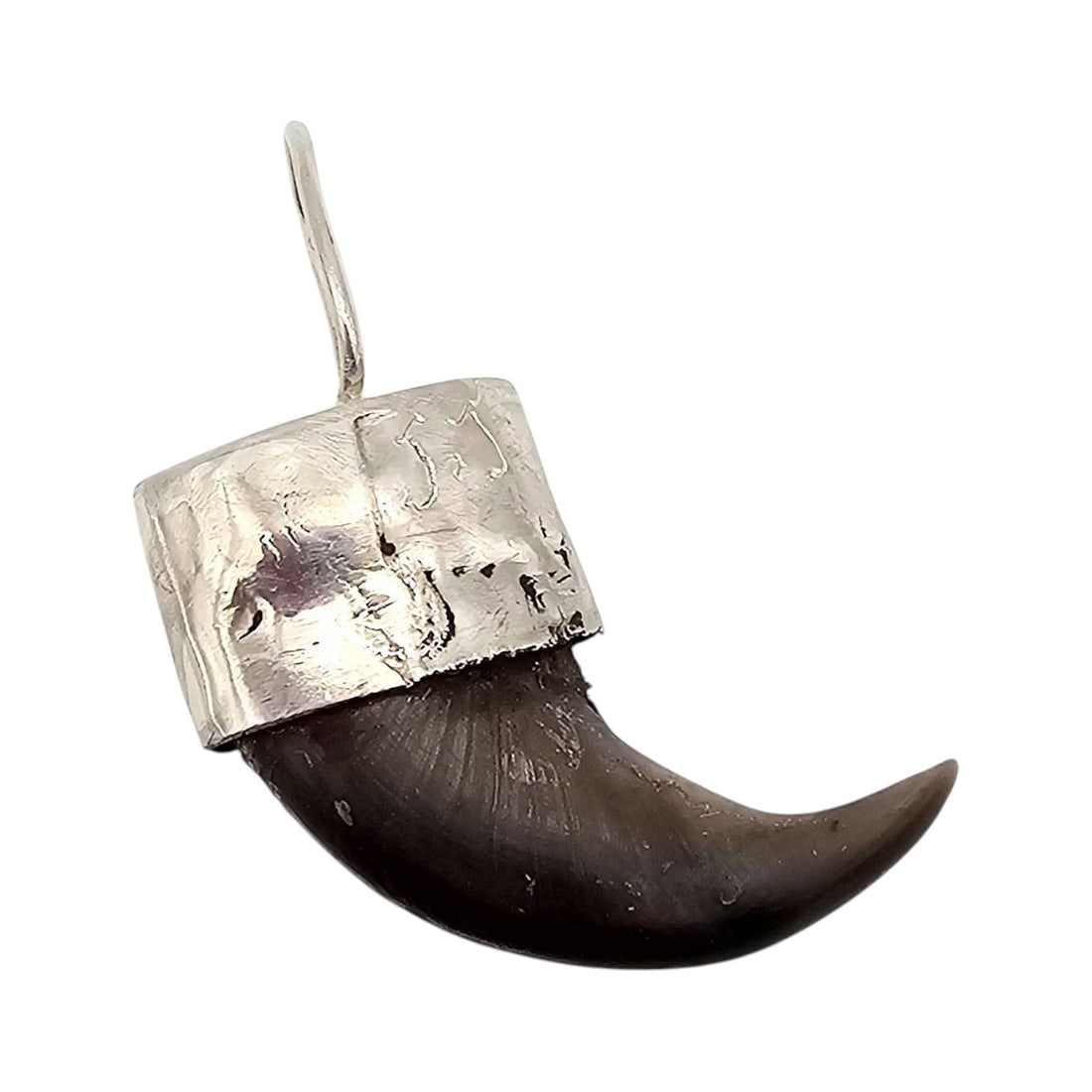 Sterling Silver Bear Claw Pendant: Bear claw pendant mounted in a sterling silver cap and loop. The claw is natural, and the silver has a textured finish. The weight is approximately 4.1 grams, and the pendant measures under 2 inches i