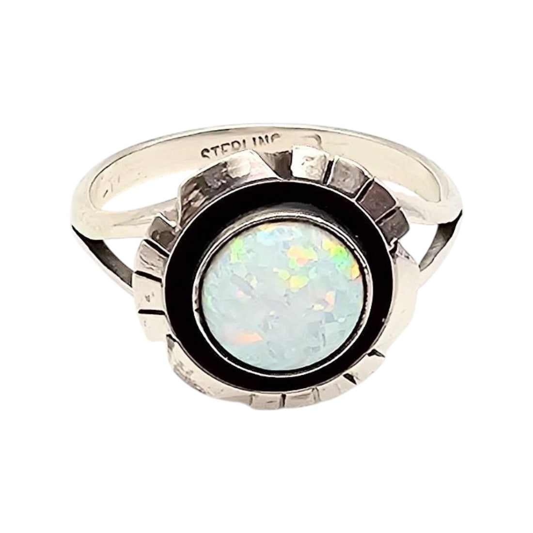 Navajo Handmade by Amos Begay Sterling Silver Opal Ring Size 8.5: A sterling silver ring featuring a central opal stone with a decorative bezel. Handmade by Navajo artisan Amos Begay, the ring is stamped "STERLING" on the band. It is size 8.5 and weighs 3.1 grams. T