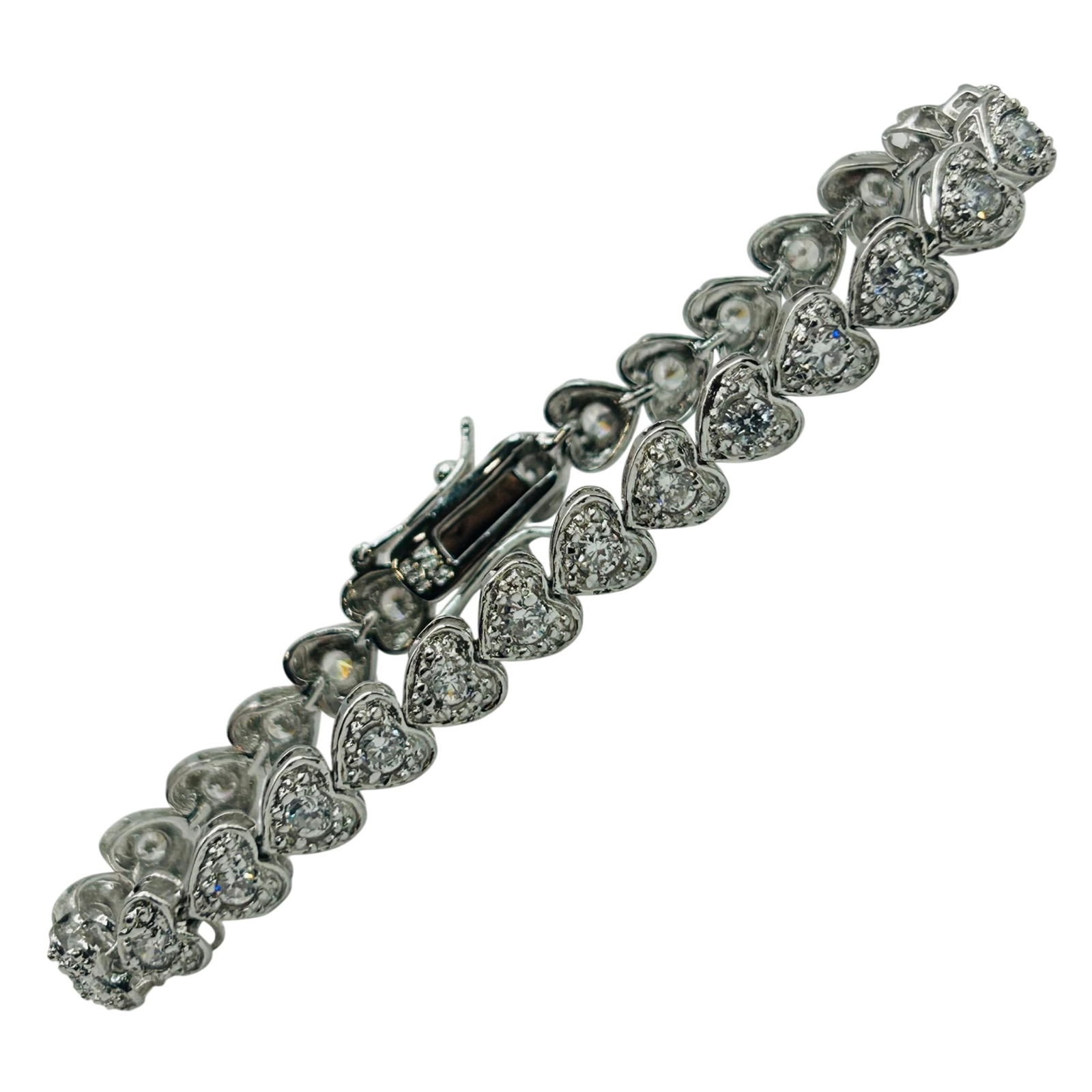 FAS Sterling Rhinestone Heart Tennis Bracelet: FAS Sterling rhinestone heart tennis bracelet. 10.90g