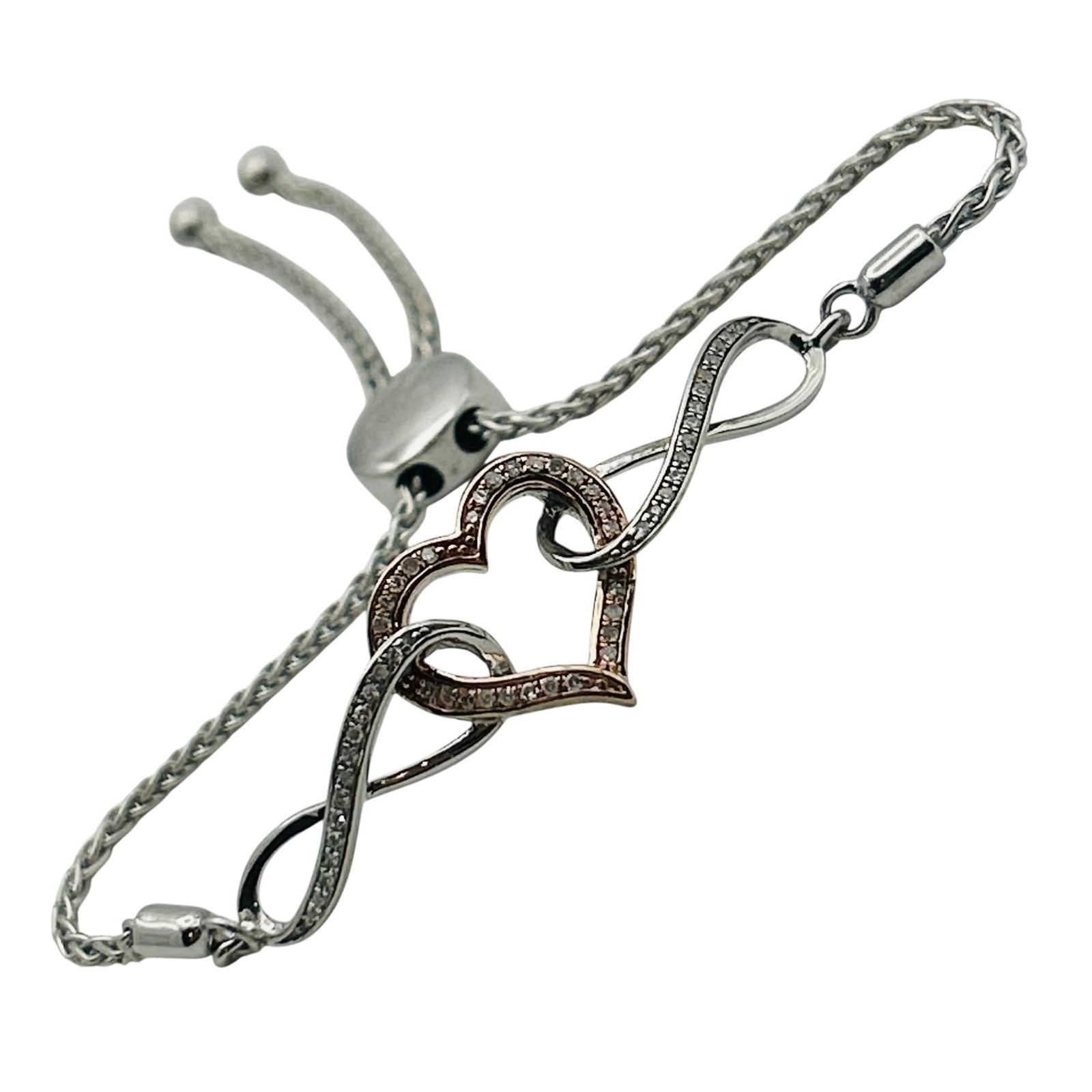 SJD Sterling And 14k Diamond Infinity Heart Adjustable Bracelet.: SJD Sterling and 14k diamond infinity heart adjustable bracelet. 6.50g