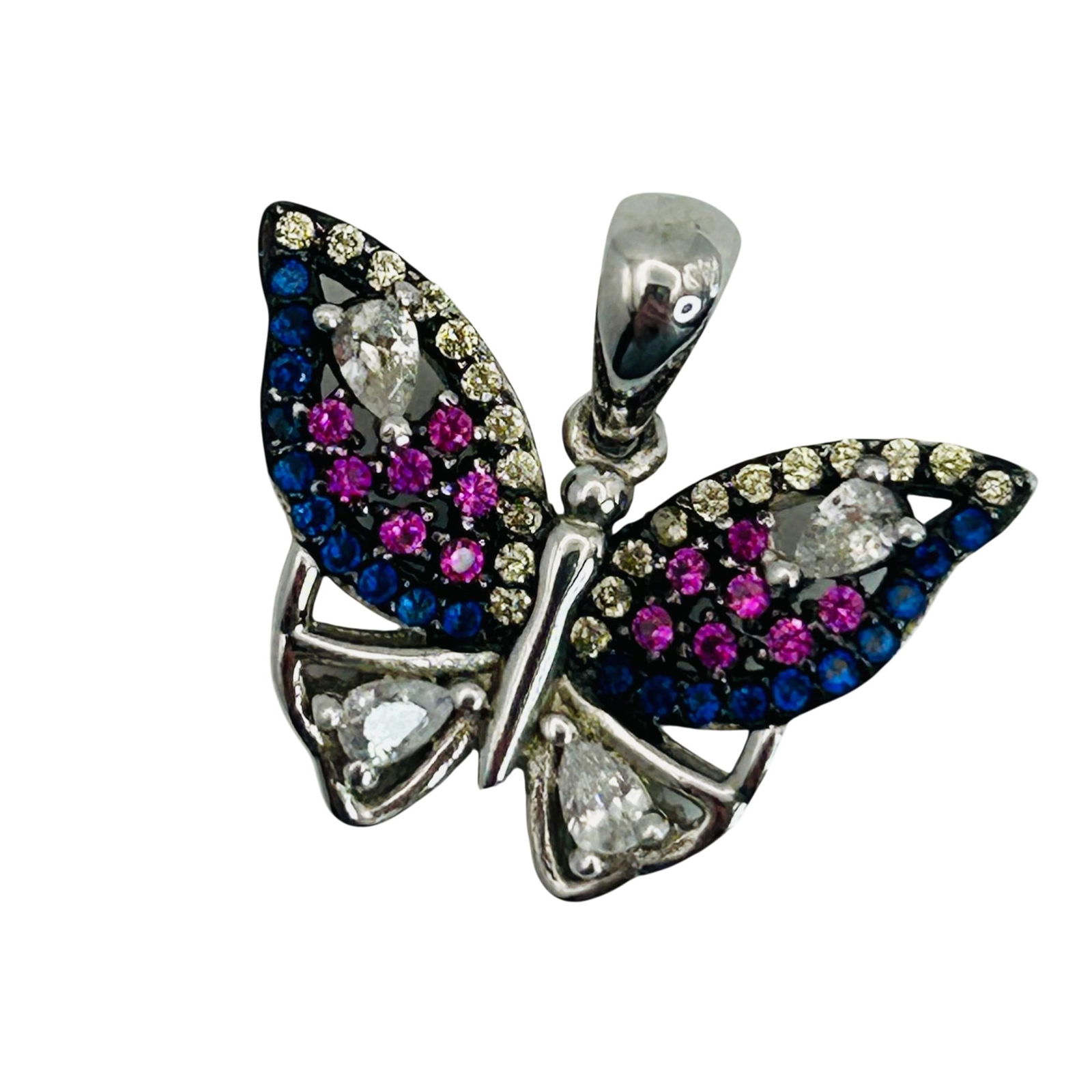 Sterling Blue Tanzanite Pink Topaz Butterfly Pendant: Sterling blue tanzanite pink topaz butterfly pendant. 2.10g