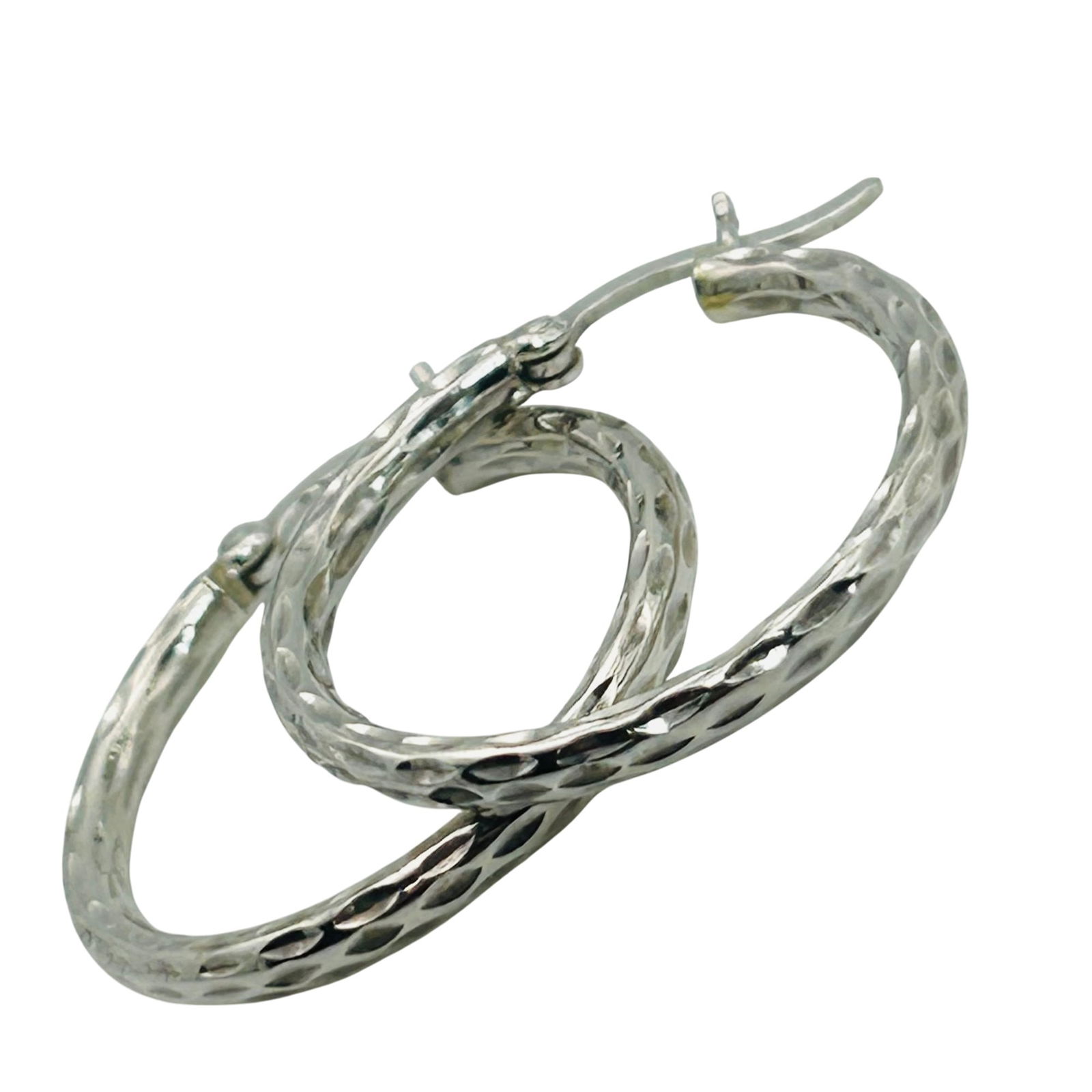 Sterling Hammered Hoop Earrings: Sterling hammered hoop earrings. 1.70g