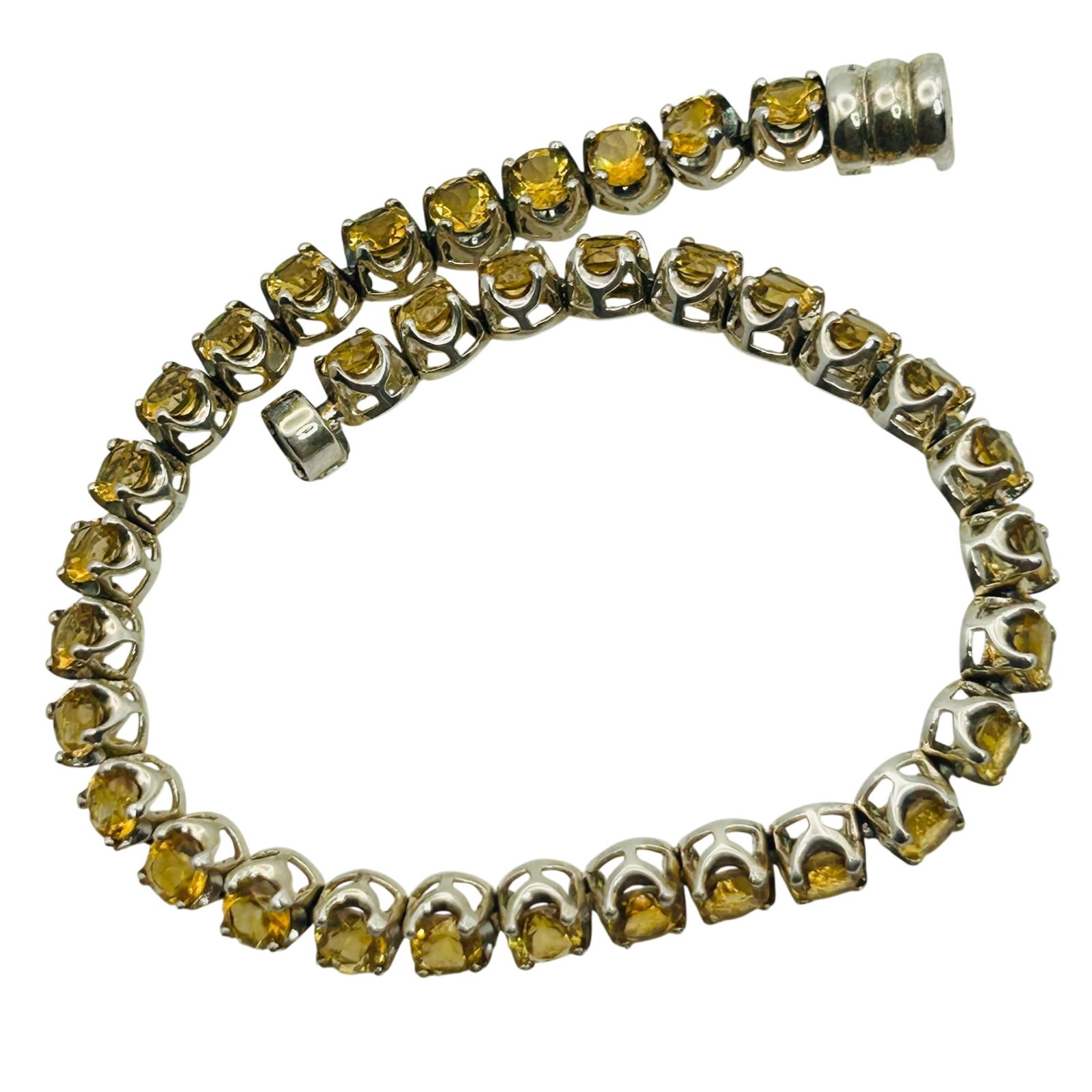 Sterling Citrine Magnetic Clasp Tennis Bracelet: Sterling citrine magnetic clasp tennis bracelet. 10.70g
