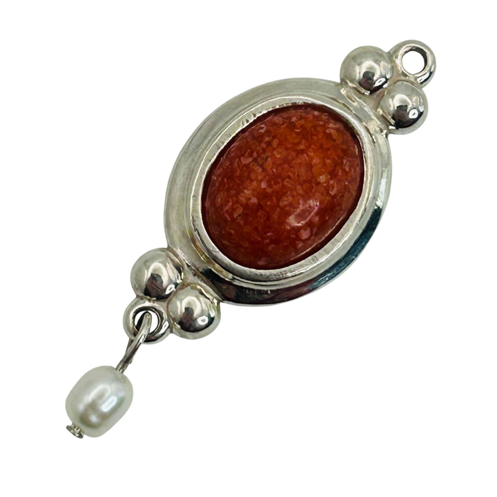 Sterling Coral Pendant: Sterling coral pendant. 4.90g
