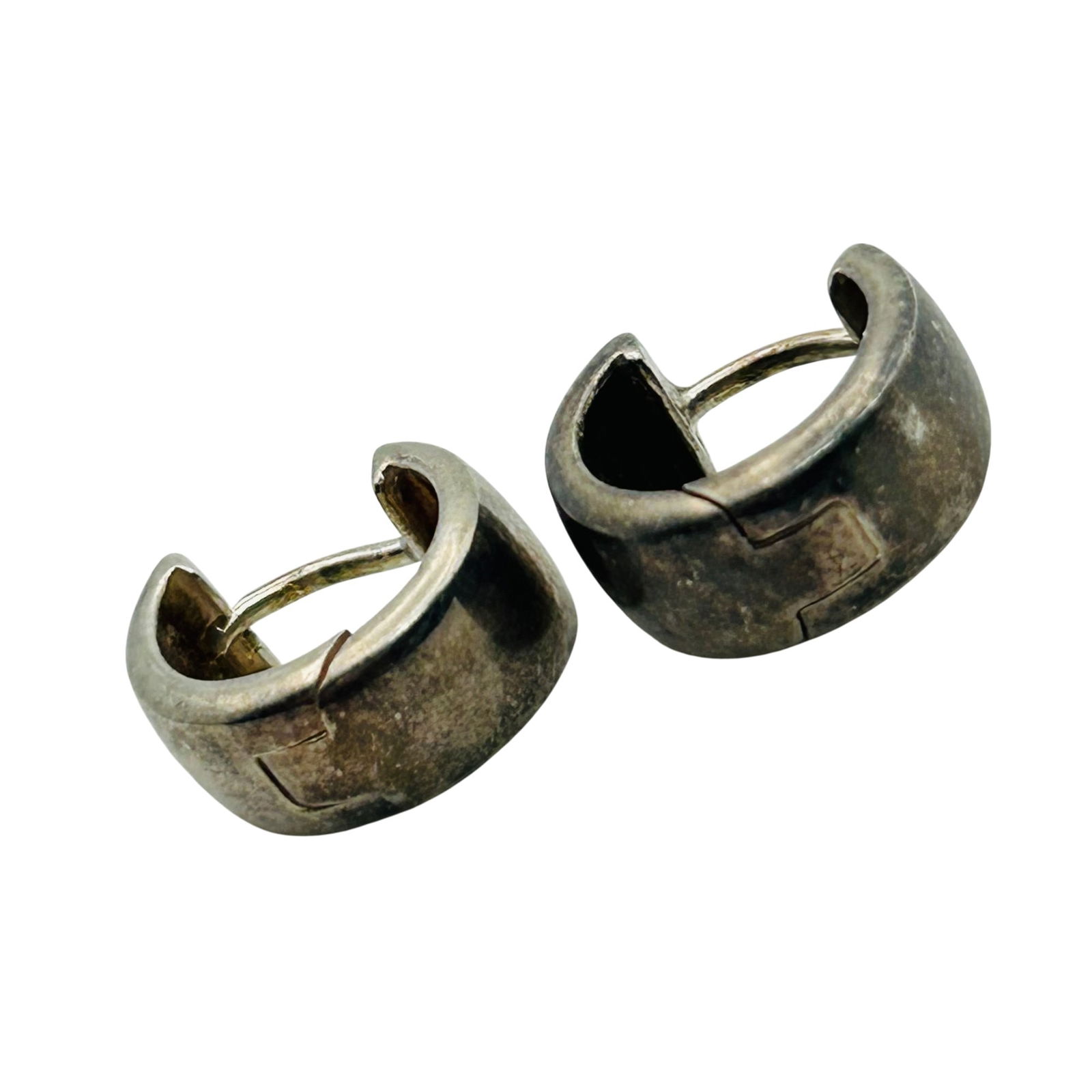 Sterling Huggie Hoop Earrings: Sterling Huggie hoop earrings. 4.20g