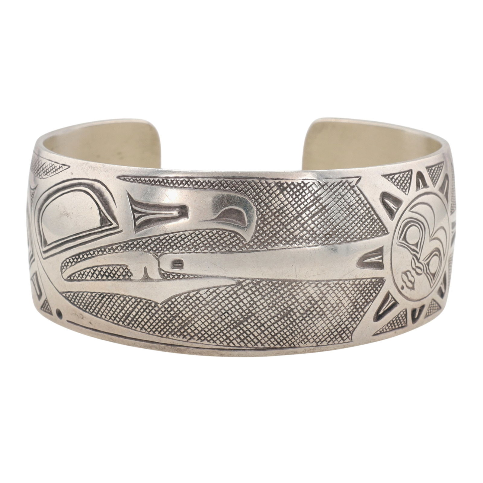 Danny Dennis Northwest Coast Indian Raven Storyteller Cuff Bracelet: Vintage Danny Dennis (Tsimshian, Frog Clan) for Metal Arts Group Northwest Coast Indian Sterling Raven and Sun Storyteller Cuff Bracelet - 57.6g
