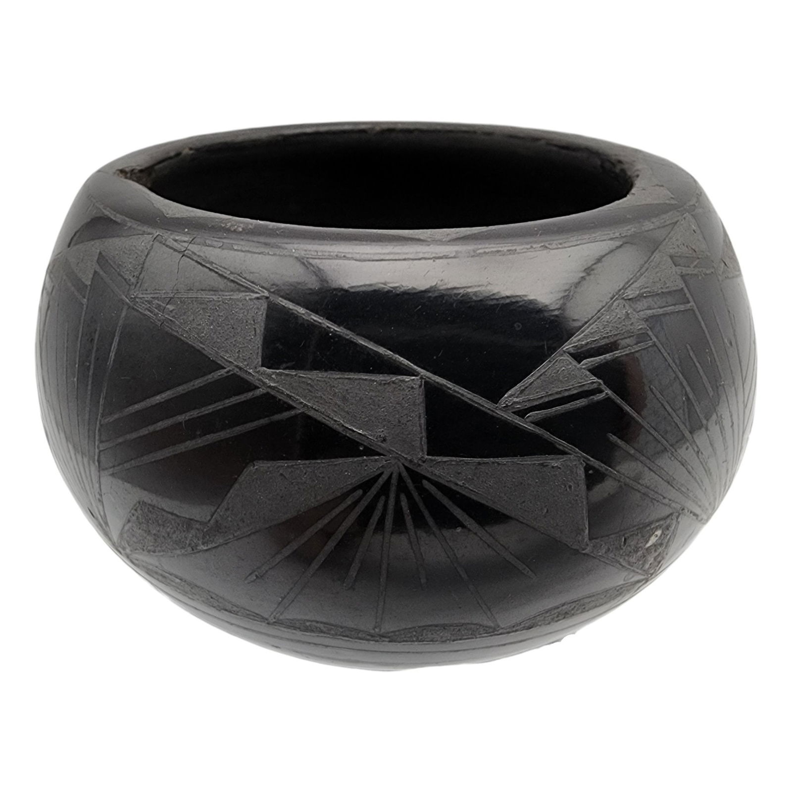 Noel & Lenore Denetchee Santa Clara Pueblo Black on Black Pot: Noel and Lenore Denetchee Santa Clara Pueblo 1995 Black on Black Pot / 125g / 2.15"h x 3.3"d / Note 1: There is a chip on the inner rim / Note 2: This item is part of an estate collection of Native