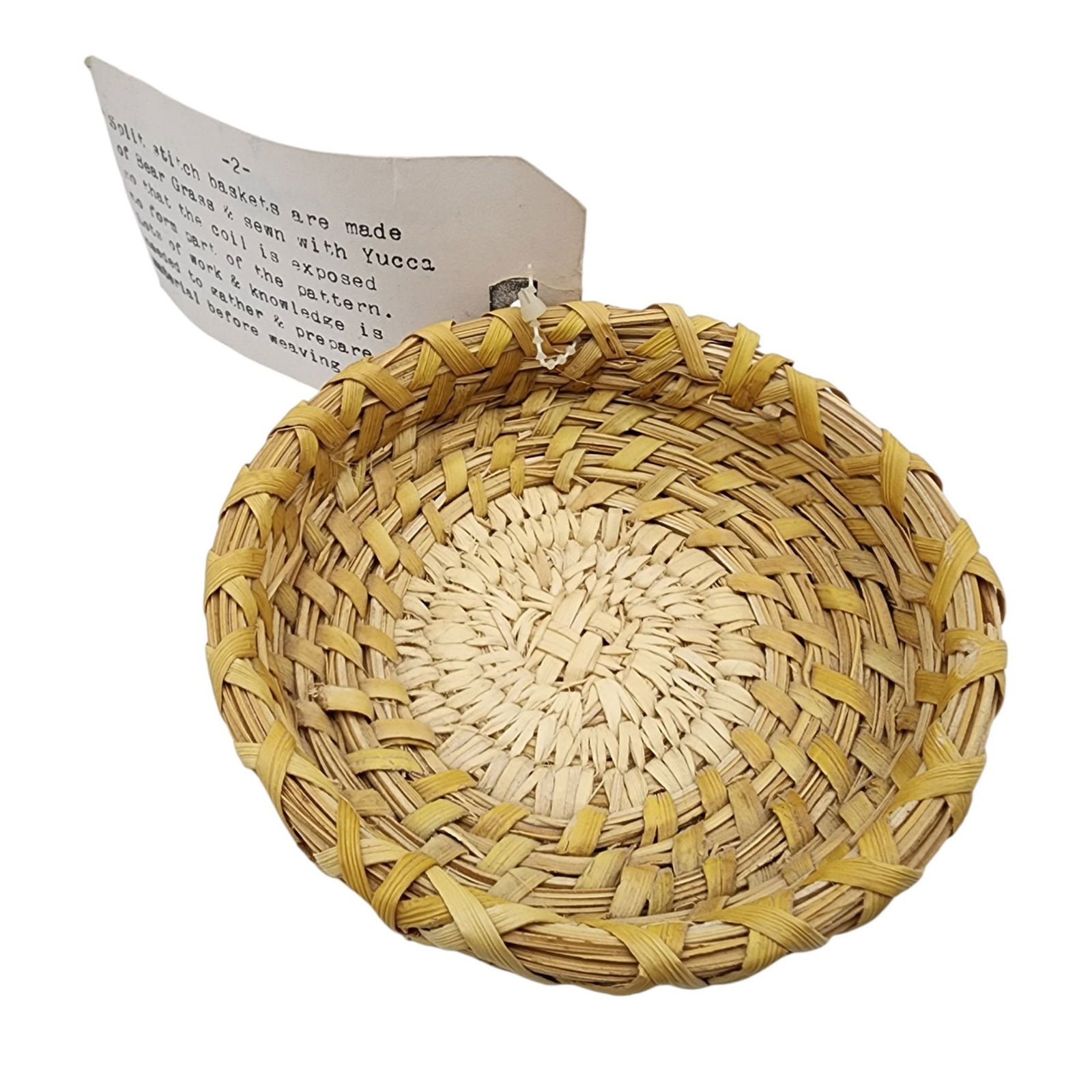 Papago Native American Basket: Papago (now known as Tohono O'odham) Native American Yucca Plant and Bear Grass Handwoven Basket / 40g / 1.2"h x 4.25"d / Comes with an attached tag with background on the basket and the Papago.