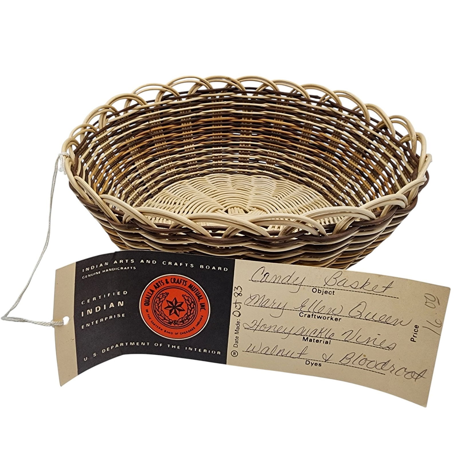 Native American Honeysuckle Vine Basket by Mary Ellen Queen, Cherokee Indian: Native American Honeysuckle Vine Candy Basket made by Mary Ellen Queen, Cherokee Indian - Made in October of 1983, purchased from Qualla Arts & Crafts / 55g / 3"h x 7.5"d / Comes with attached tag