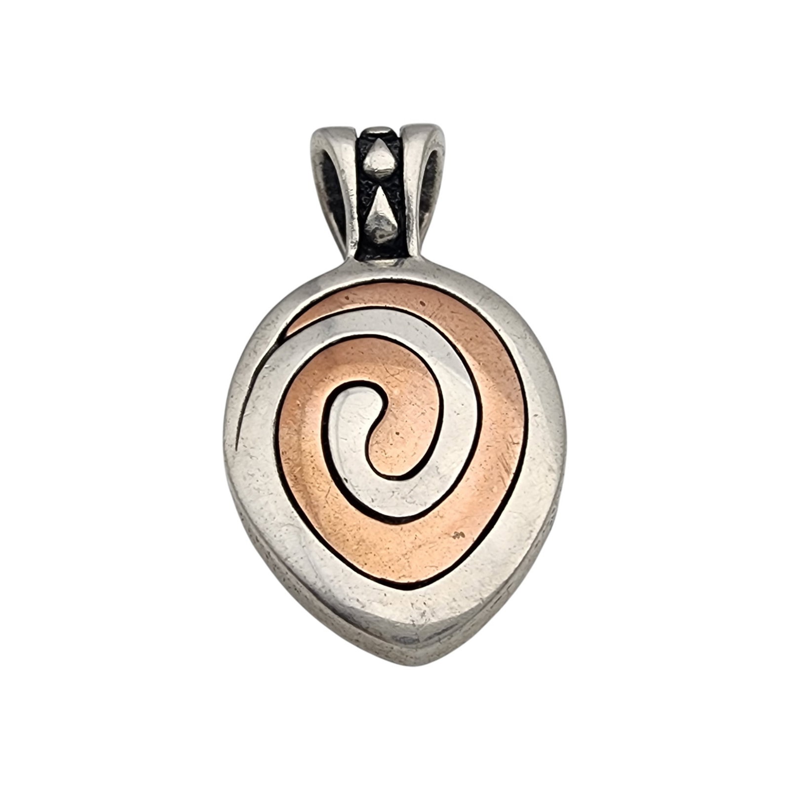 Waldeck Johnson Sterling and Copper Swirl Pendant: Waldeck "Johnson" Jewelers & KJ (Possibly "Kenneth Johnson" based on consignors research - unable to confirm secondary artist mark) Sterling and Copper Swirl Pendant | 5.9g