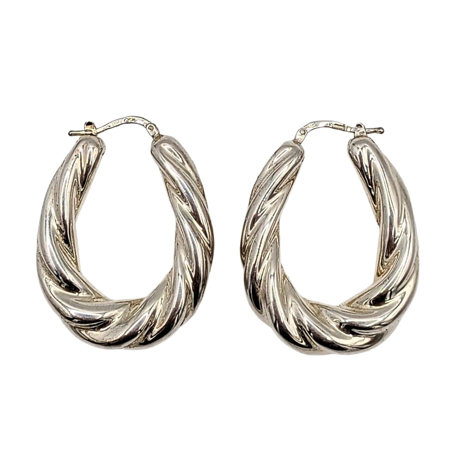 Signed Sterling Silver Twisted Hollow Form Hoop Earrings: Signed Sterling Silver Twisted Hollow Form Hoop Earrings. Signed 925 JCM Mauritius. 7.9g