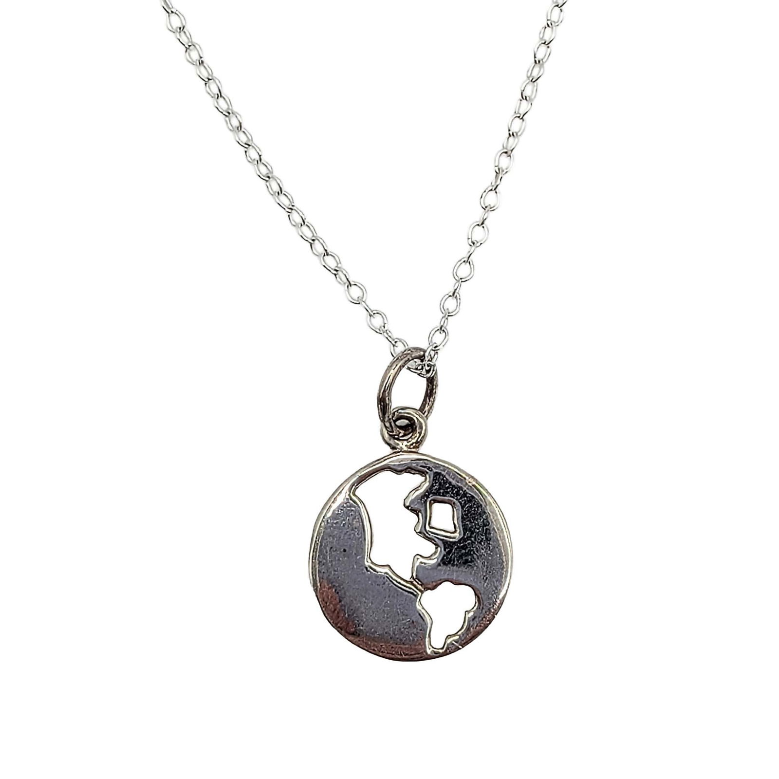 Sterling Silver Earth Charm Necklace: Sterling Silver Earth Charm Necklace. 17-19in Length (Adjustable). Signed 925. 1.9g