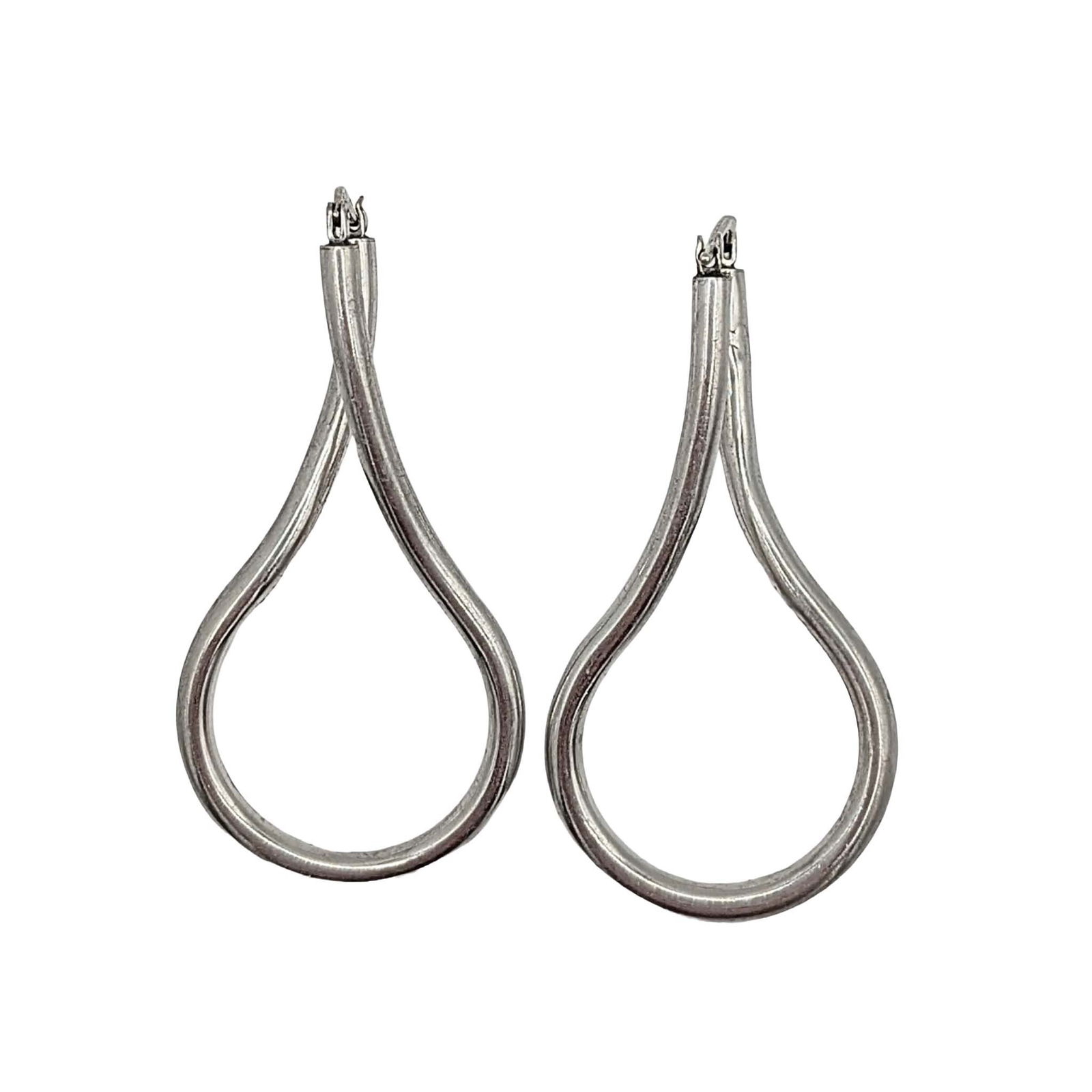 Signed Sterling Silver Twisted Hoop Earrings: Signed Sterling Silver Twisted Hoop Earrings. Signed heart symbol 925. 3.8g