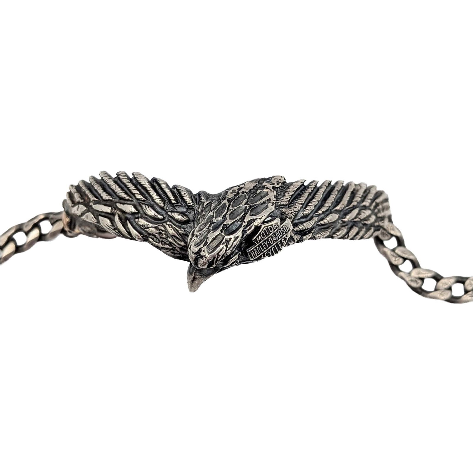 Harley Davidson Sterling Silver Flying Eagle Bracelet: Harley Davidson Sterling Silver Flying Eagle Curb Chain Bracelet. 8in Length. Signed Harley Davidson Motorcycles Sterling. 40.5g