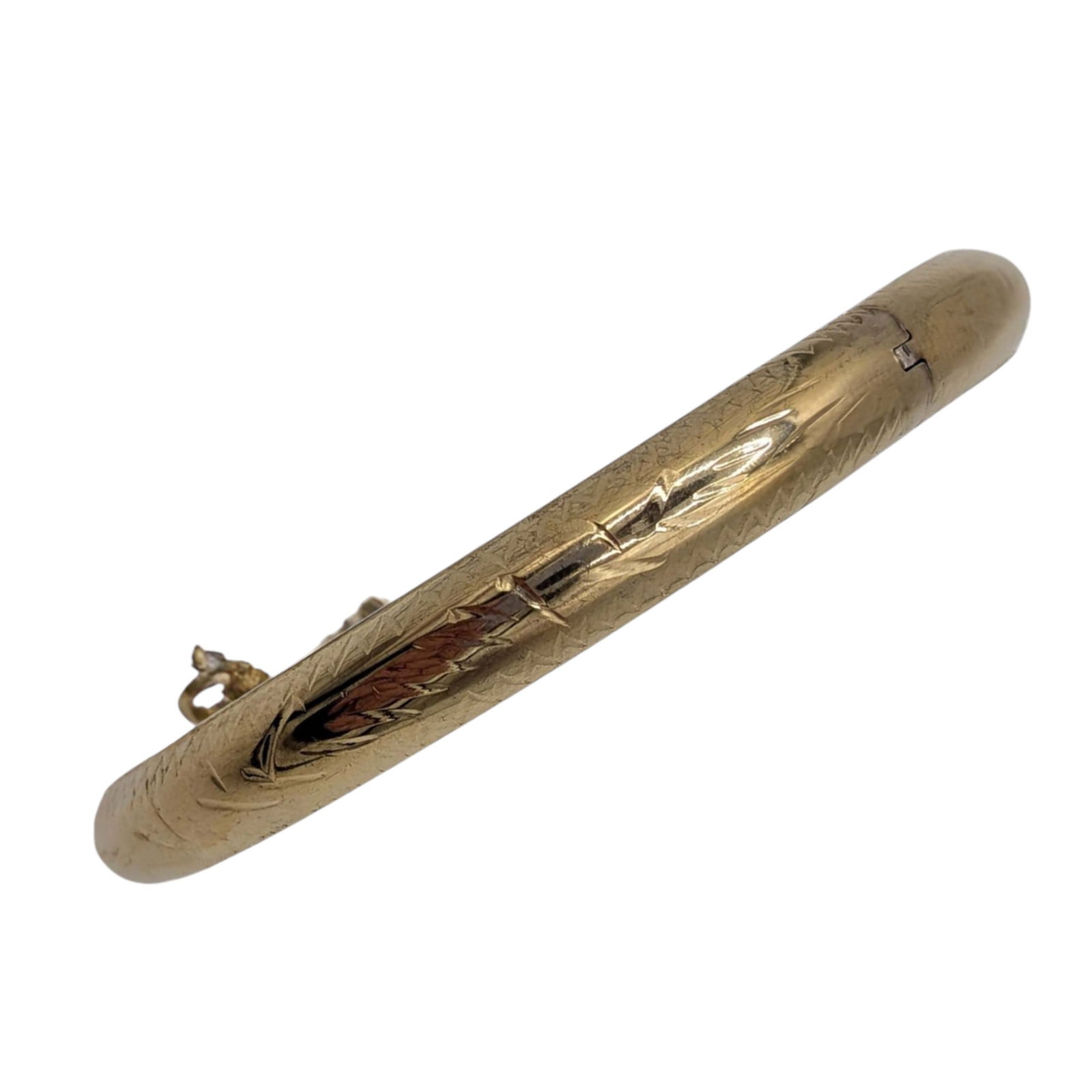 Signed Gold Over Sterling SIlver Engraved Bangle Bracelet: Signed Gold Over Sterling Silver Engraved Bangle Bracelet with Safety Chain. 7.5in Length. Signed 925 Y. 9.6g