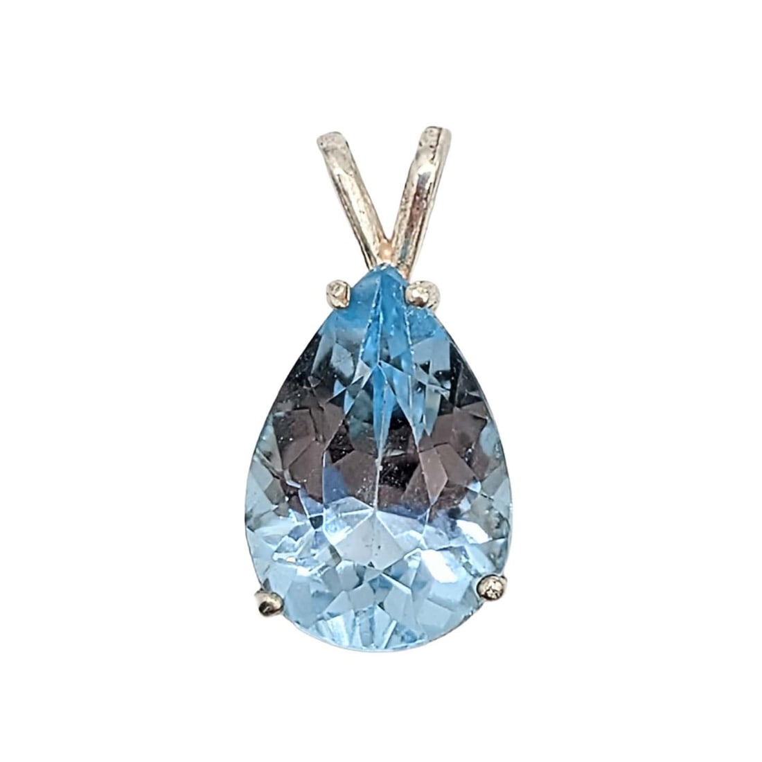 Sterling Silver Blue Topaz Teardrop Pendant: Sterling Silver Blue Topaz Teardrop Pendant. Signed 925. 2g