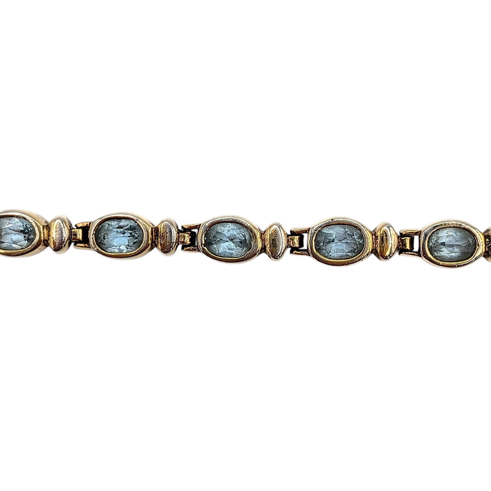 Gold Over Sterling Silver Topaz Oval Tennis Bracelet: Gold Over Sterling Silver, Blue Topaz Oval Tennis Bracelet. 8.25in Length. Signed 925. 14.6g