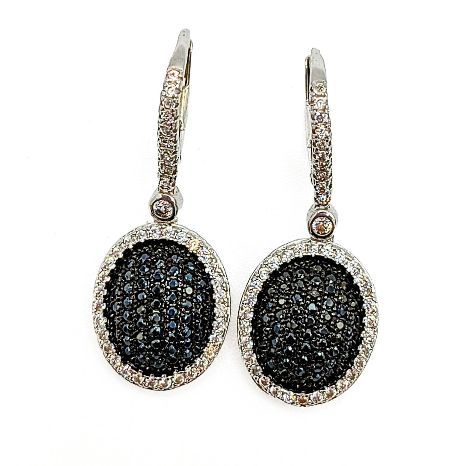 Signed Sterling Silver Onyx Topaz Pave Set Dangle Earrings: Signed Sterling Silver, Onyx, Clear Topaz Pave Set Oval Dangle Drop Earrings. Signed 925 CN FZN. 4.4g