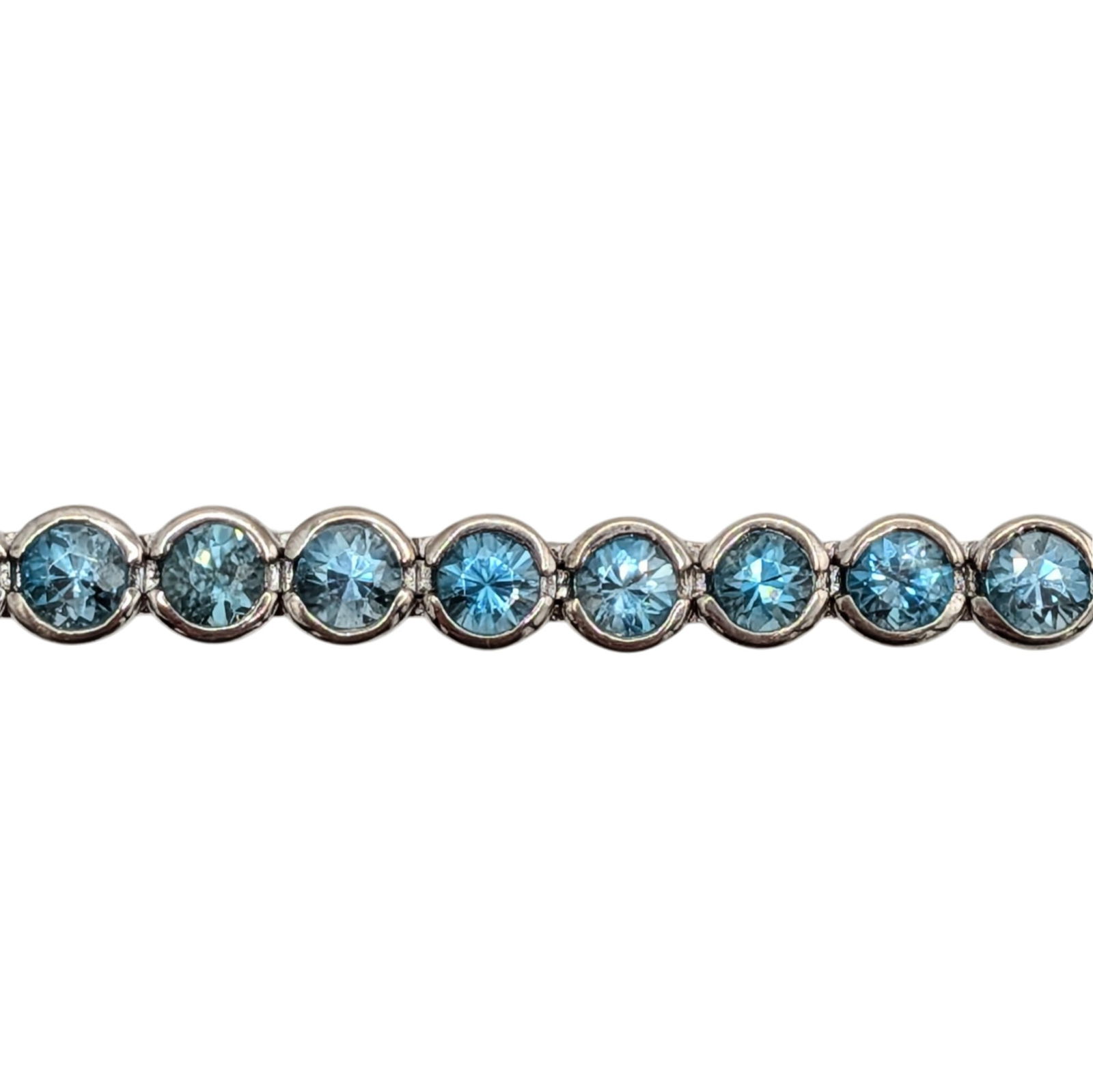 Signed Sterling Silver Blue Topaz Tennis Bracelet: Signed Sterling Silver, Blue Topaz Tennis Bracelet. 8.25in Length. Signed lotus symbol 925 China. 14.2g