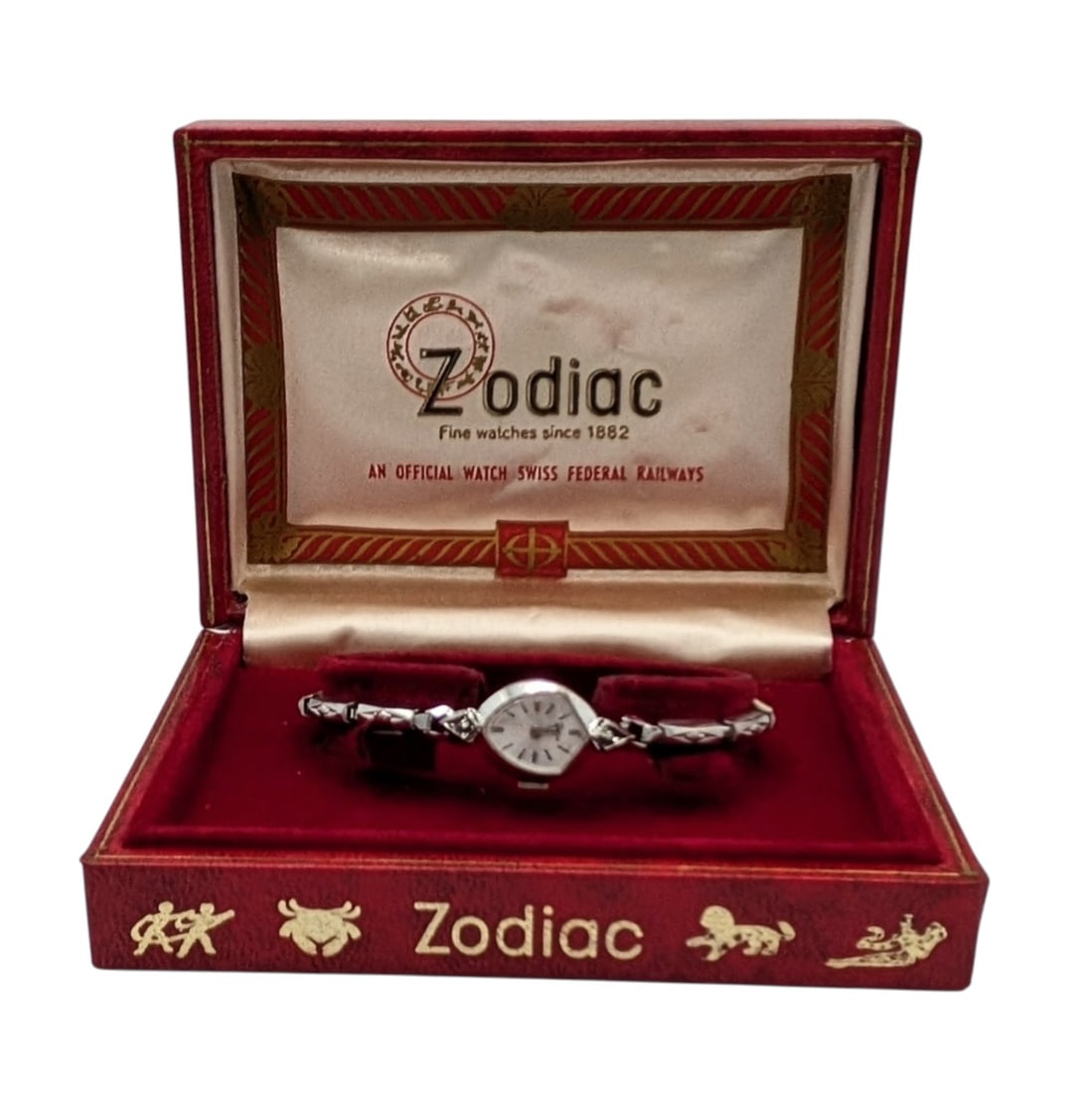 Zodiac Vintage 10KT White Rolled Gold Diamond Womens Watch: Zodiac Vintage 10KT White Rolled Gold, Stainless Steel, Diamond Womens Watch. 6in Length. Signed Stainless Steel 10K RGP Bezel Zodiac. 12.1g