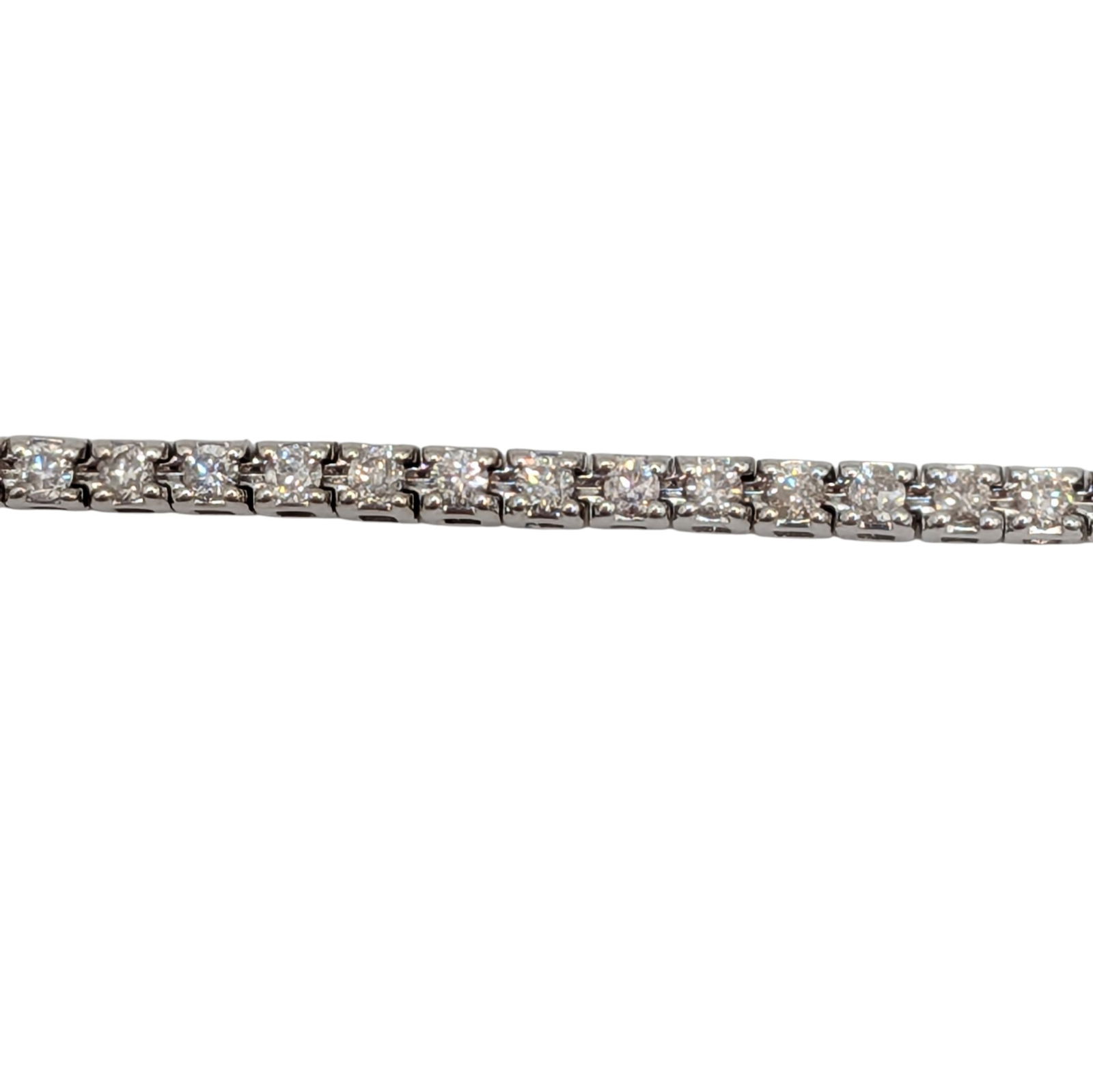 Signed 14KT White Gold Diamond 1.5mm Tennis Bracelet: Signed 14KT White Gold, Diamond 1.5mm Tennis Bracelet. 8in Length. Signed 14K EDCC. 4.6g