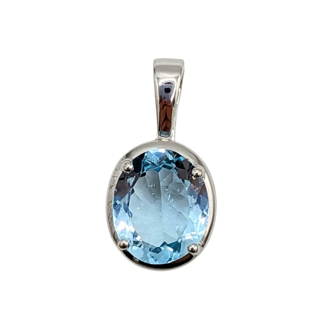 Signed 14KT White Gold Topaz Oval Pendant: Signed 14K White Gold, Blue Topaz Oval Pendant. Signed JH 14K. 2.2g