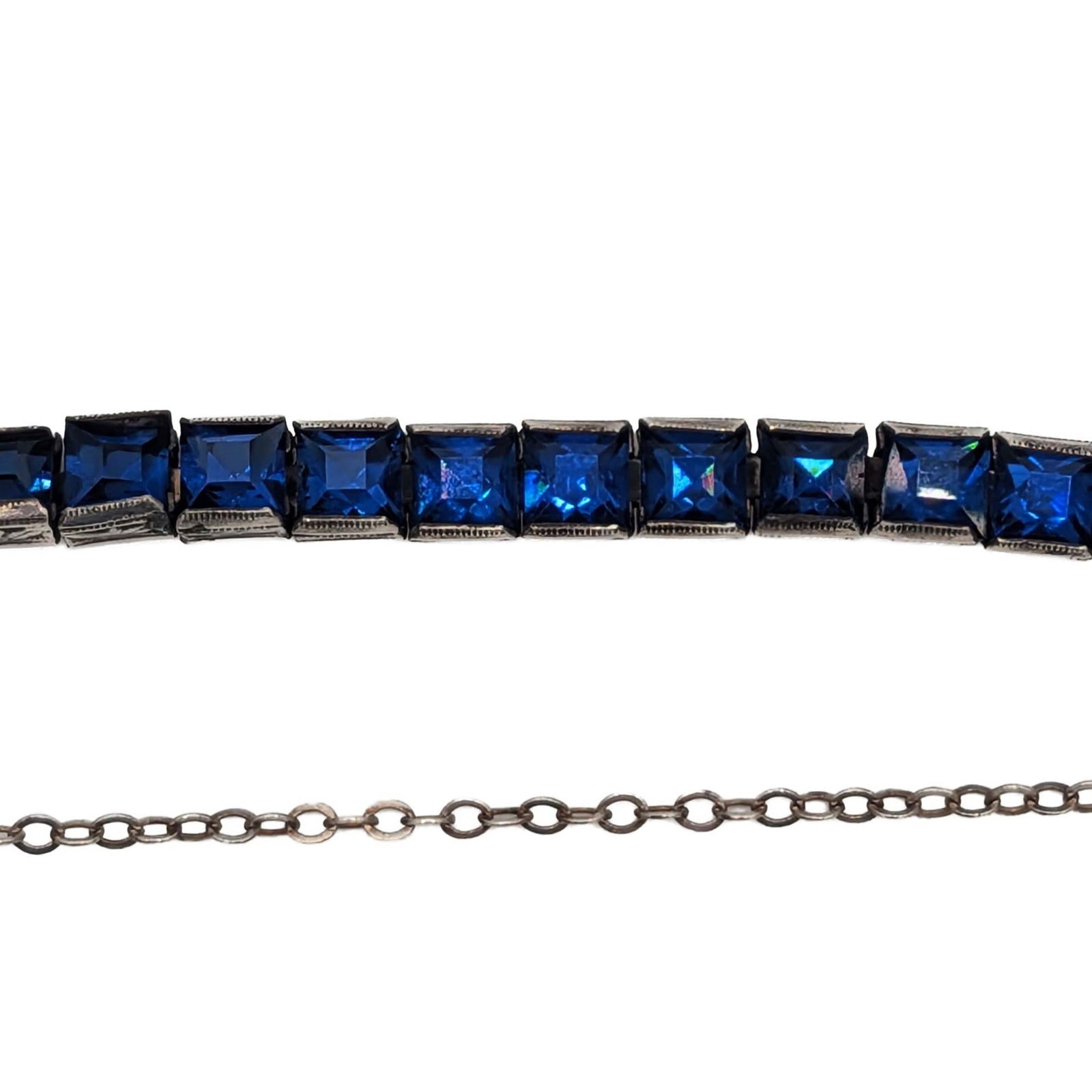 Antique Sterling Silver Blue Rhinestone Tennis Bracelet: Antique Sterling Silver, Blue Rhinestone Deco Tennis Bracelet. 6.5in Length. Signed Sterling. 8.3g