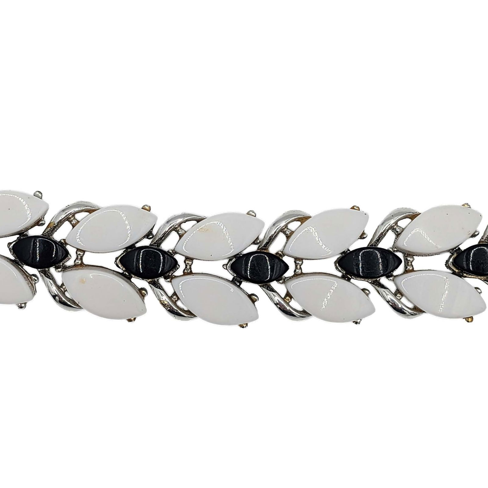 Vintage Silver Tone Metal Black/White Acrylic Articulated Leaf Bracelet: Vintage Silver Tone Metal, Black/White Acrylic Articulated Leaf Bracelet. 8.5in Length. Unsigned. 41.3g