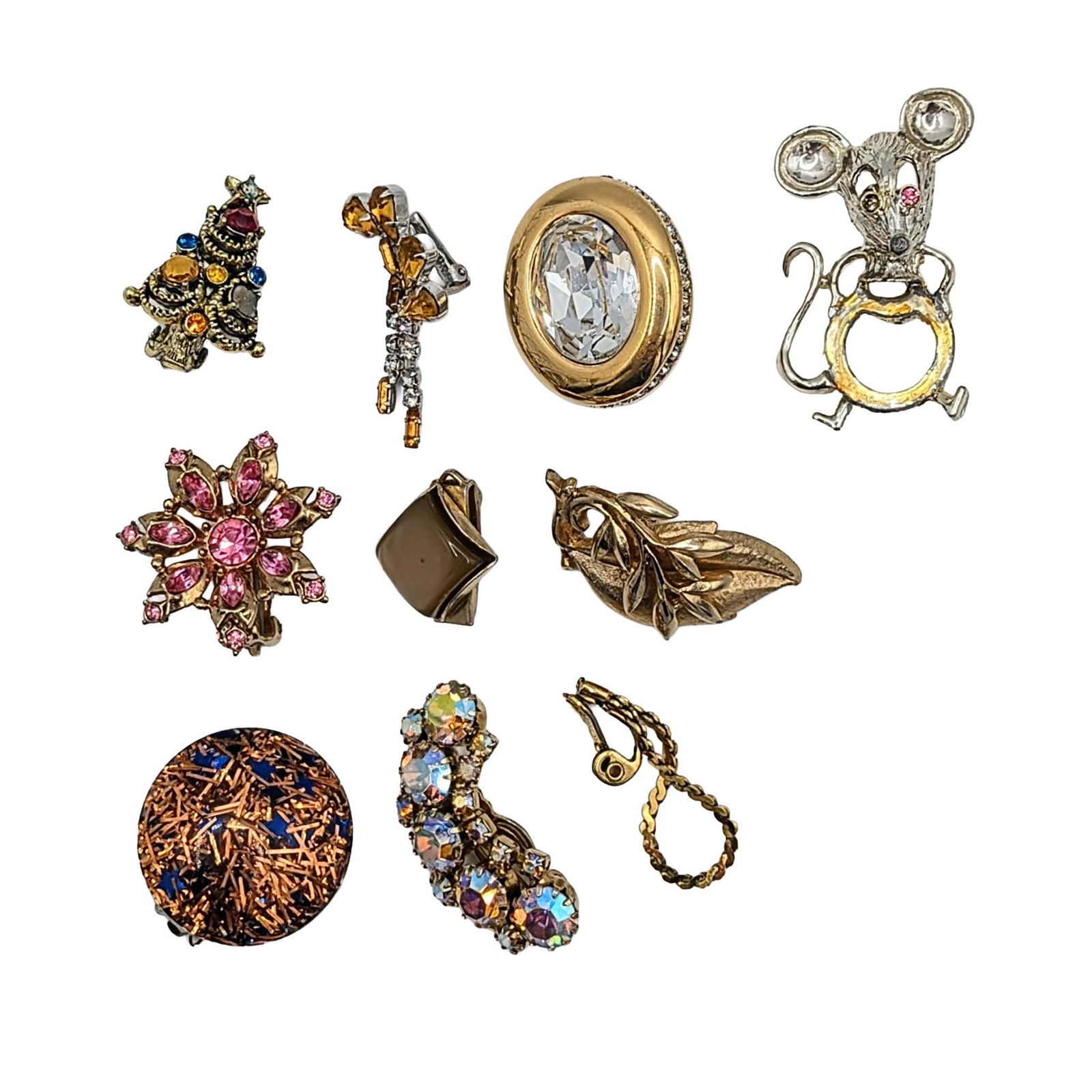 Signed Rhinestone Costume Jewelry Lot: Signed Silver Tone Metal, Gold Tone Metal, Rhinestone Costume Jewelry Lot. Signed HollyCraft, Pakula, Sarah Coventry, Monet, Gerrys, Swarovski. AS IS missing pieces. 84g