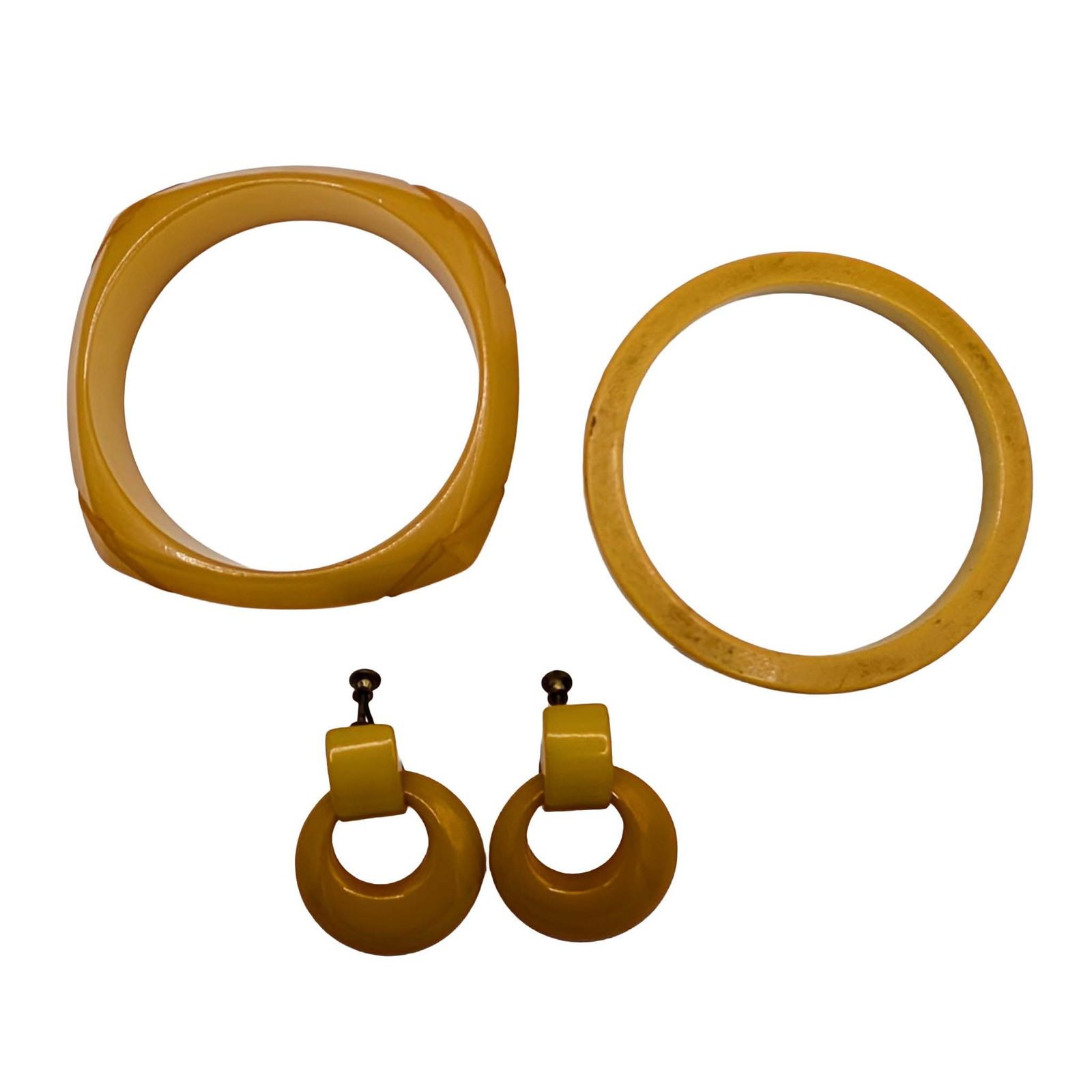 Vintage Golden Plastic Jewelry Lot: Vintage Golden Plastic Bangle Bracelets and Screw Back Earrings Lot. Unsigned. 58.4g