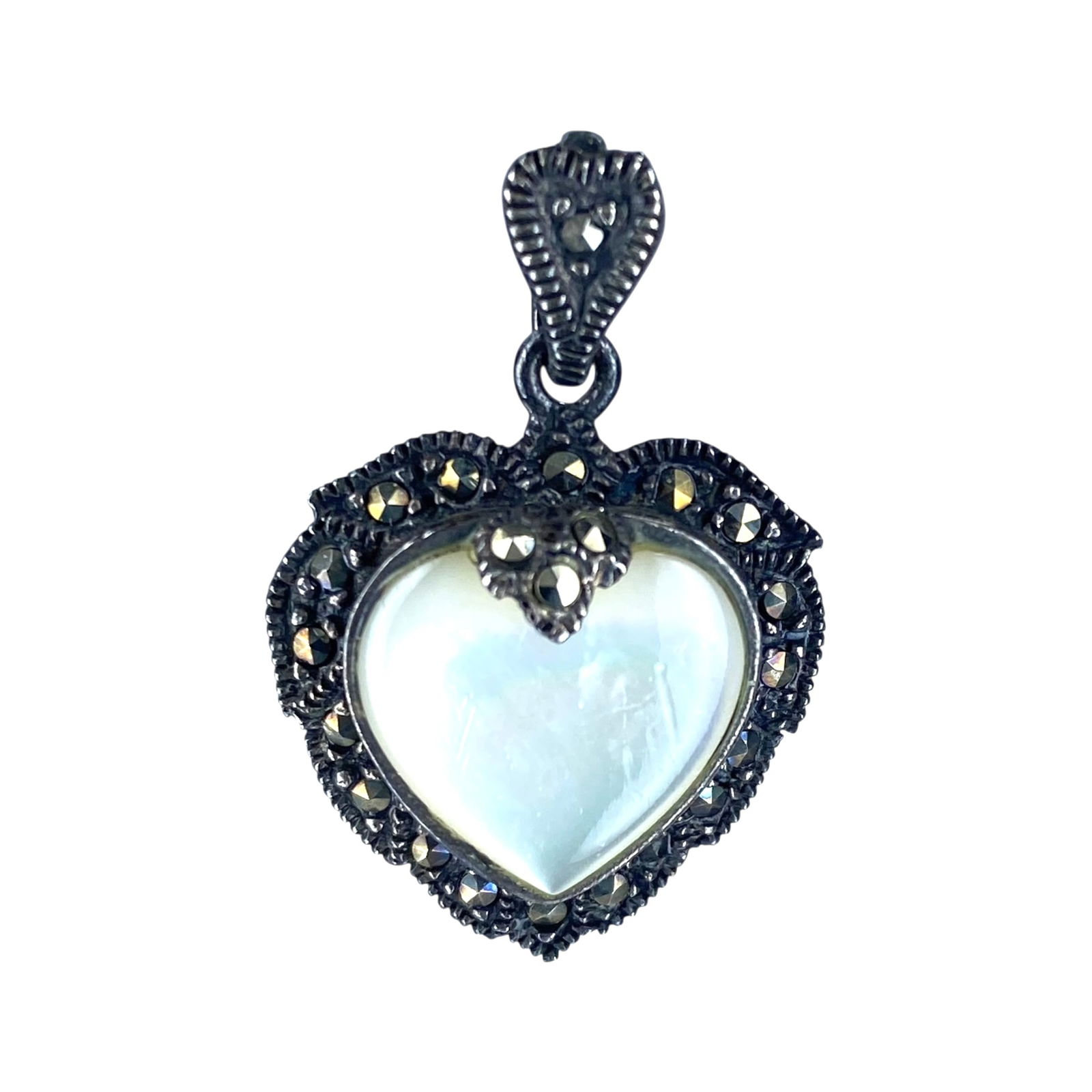 Sterling Multi Stone Vintage Heart Pendant 3.5: Sterling Marcasite and Mother of Pearl Vintage Heart Pendant 3.5 Engraved 02? (The engravings are not very legible) missing one Marcasite stone, sold as is