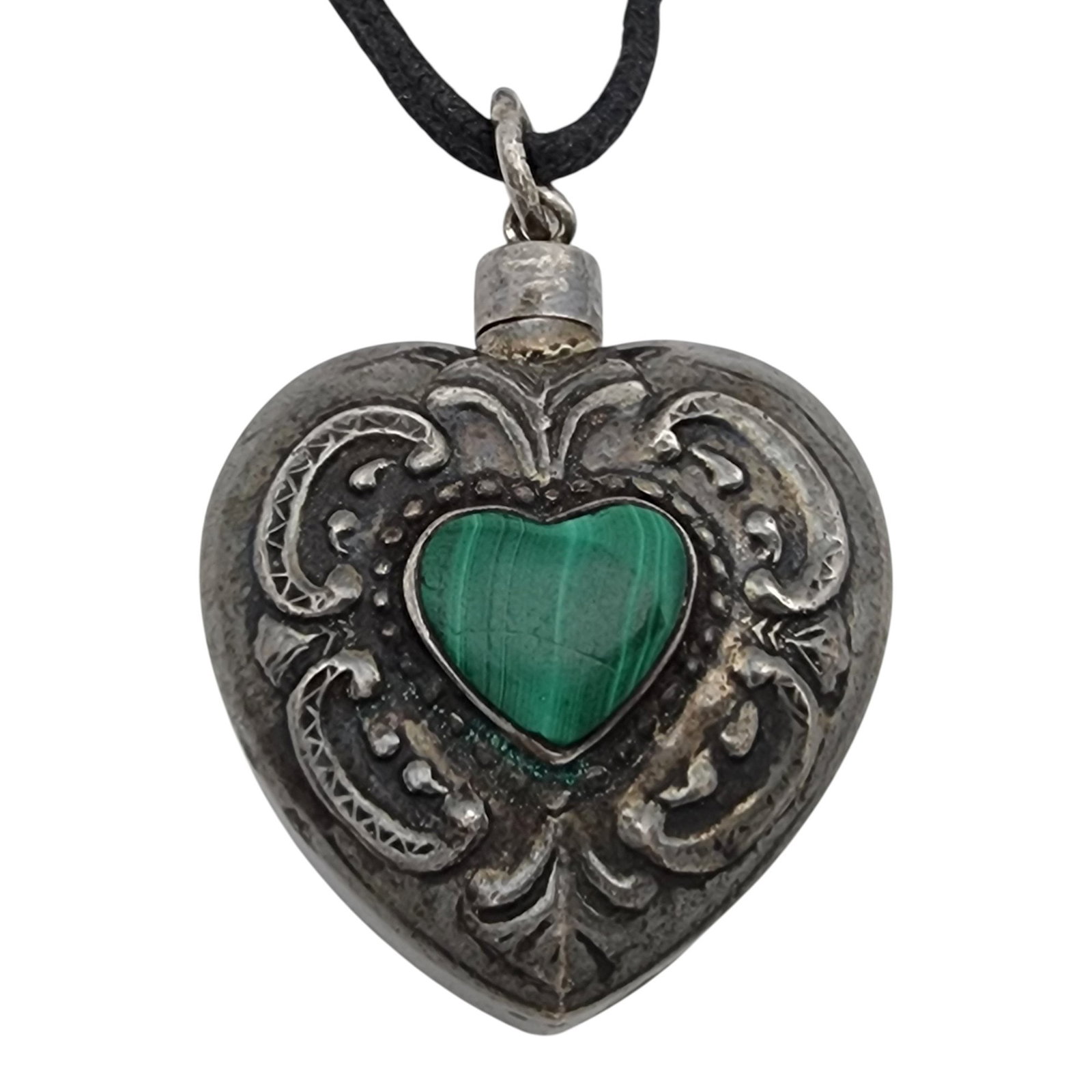 Vintage Sterling Malachite Repousse Heart Necklace: Vintage Sterling Malachite Repousse Heart Necklace - 12.2g (weight of the sterling pendant only, not the black cord) - (there is a seam that makes it look like the pendant top may twist open and be a