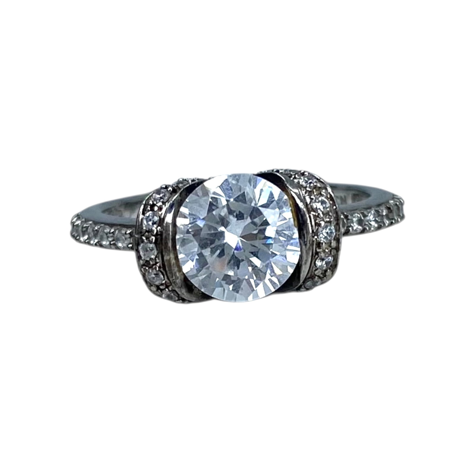 Signed Sterling Rhinestone Ribbon Halo Ring SZ 9 4.01g: Signed Sterling Rhinestone Ribbon Halo Ring SZ 9 4.01g Engraved 925 CN, D in a square, Sold as is - missing a side stone