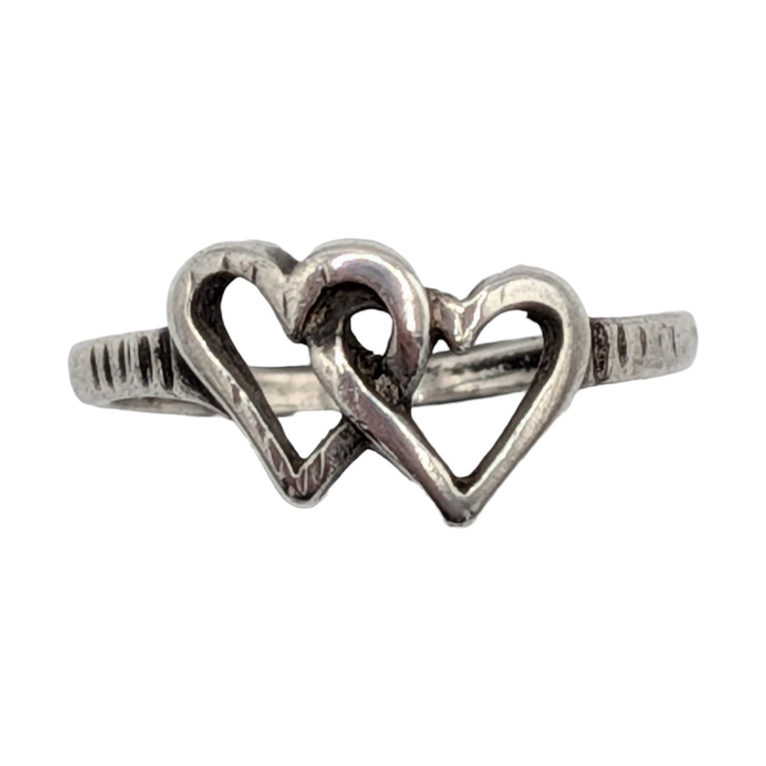Sterling Silver Intertwined Hearts Ring: Sterling Silver Intertwined Hearts Ring. Size 3.75. Signed diamond STER. 1.2g