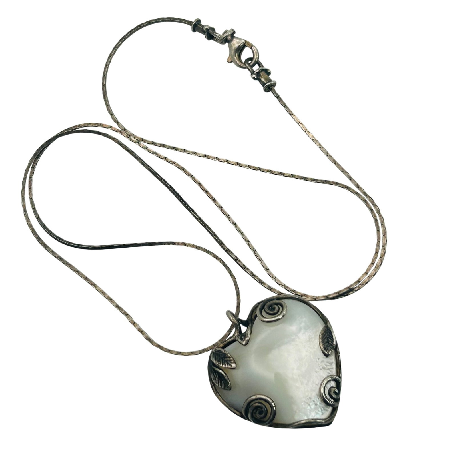 Israel Sterling Mother Of Pearl Heart Pendant: Israel Sterling mother of pearl heart pendant. 9.9g