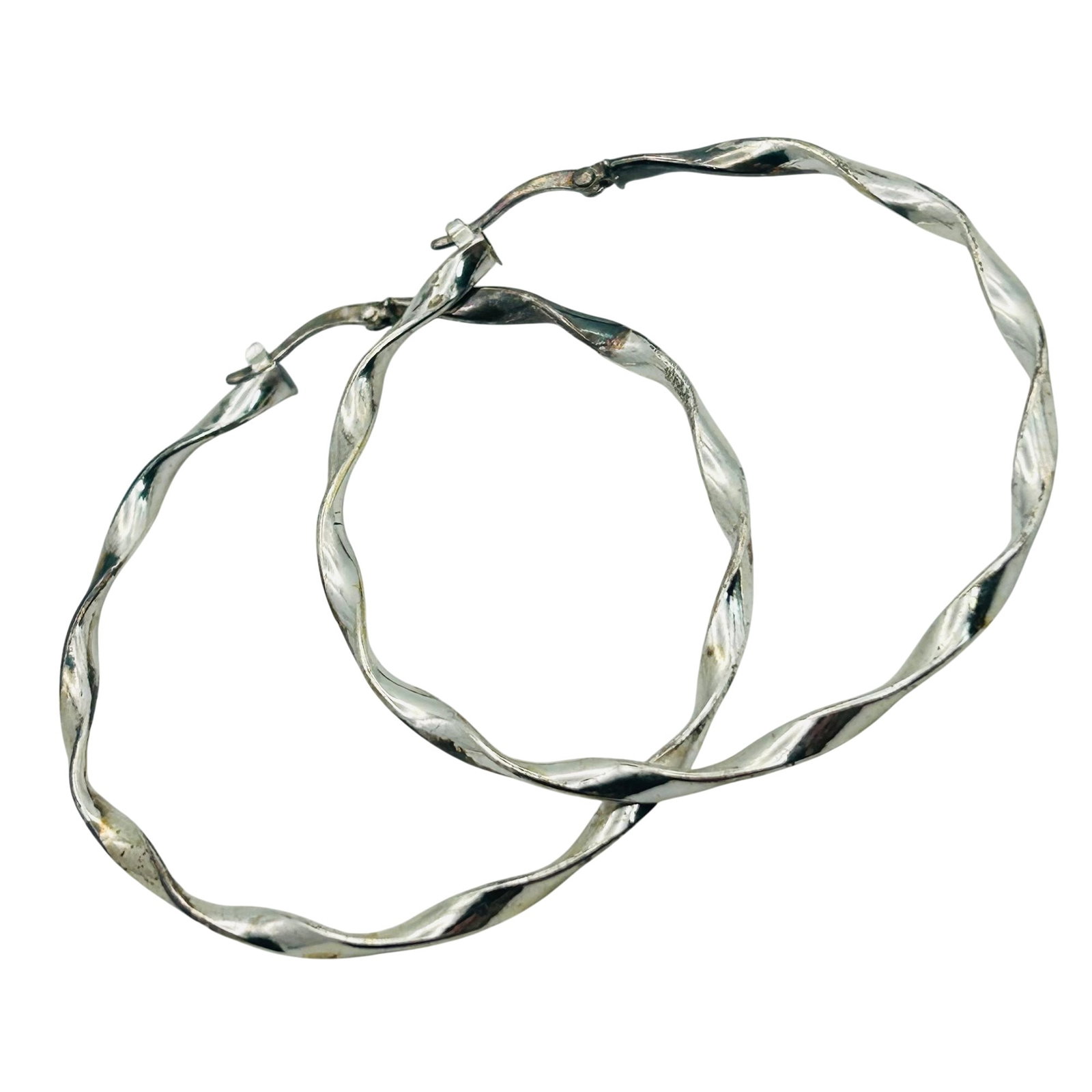 JCM Sterling Twisted Hoop Earrings: JCM Sterling twisted hoop earrings. 5.3g