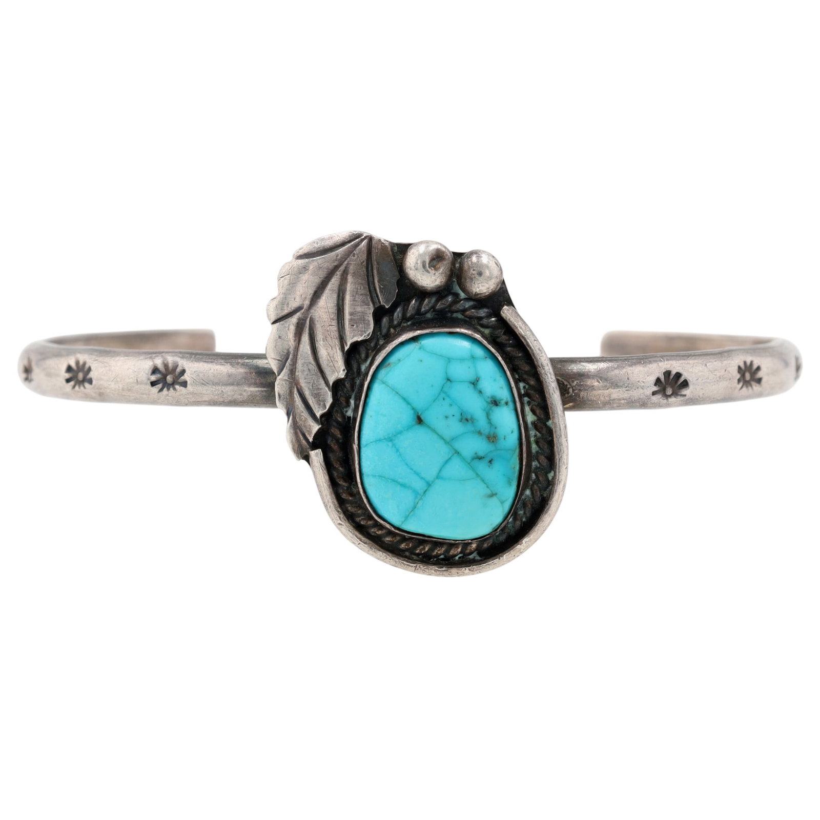 Vintage Navajo Sterling Turquoise Cuff Bracelet: Vintage Navajo Sterling Turquoise Stamped Cuff Bracelet / 15.2g / Approximate inner circumference, incl. gap: 6.25", Gap: 1.25" / Fine cracks in turquoise, setting is secure and intact