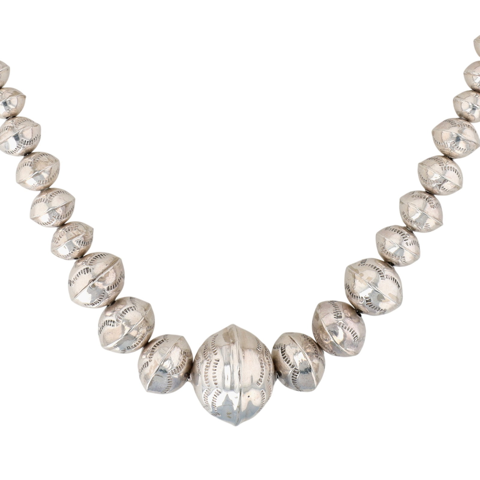 Navajo Sterling Stamped Handmade Graduated Bead Necklace: Vintage Navajo Sterling Stamped Handmade Graduated Bead Necklace | Weight: 78g | Approx. 26.5" | Beads ranging from 10mm to 20mm and a large 30mm center bead. Gorgeous necklace!